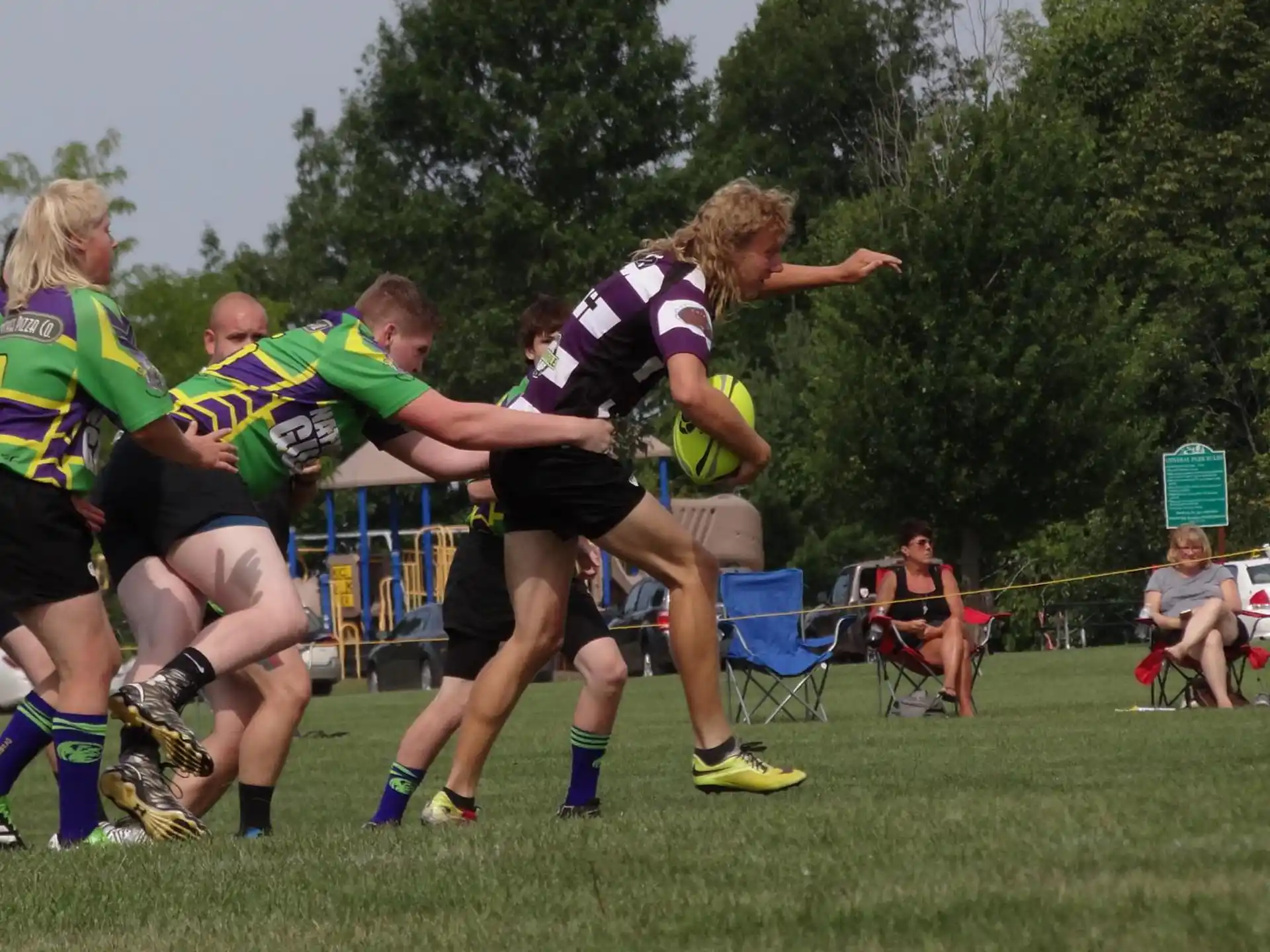 a group of women playing rugby