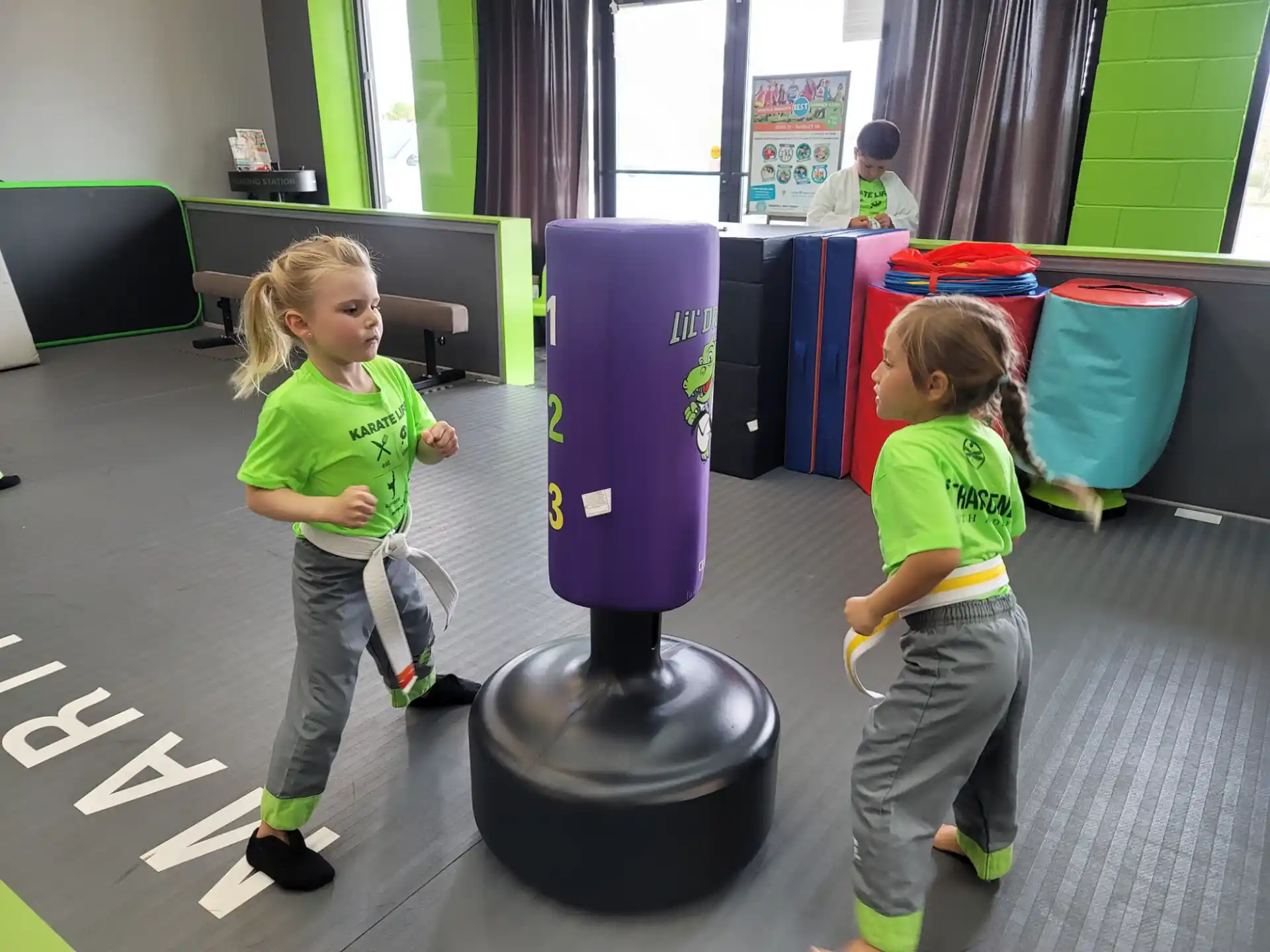 a couple of children playing with a toy