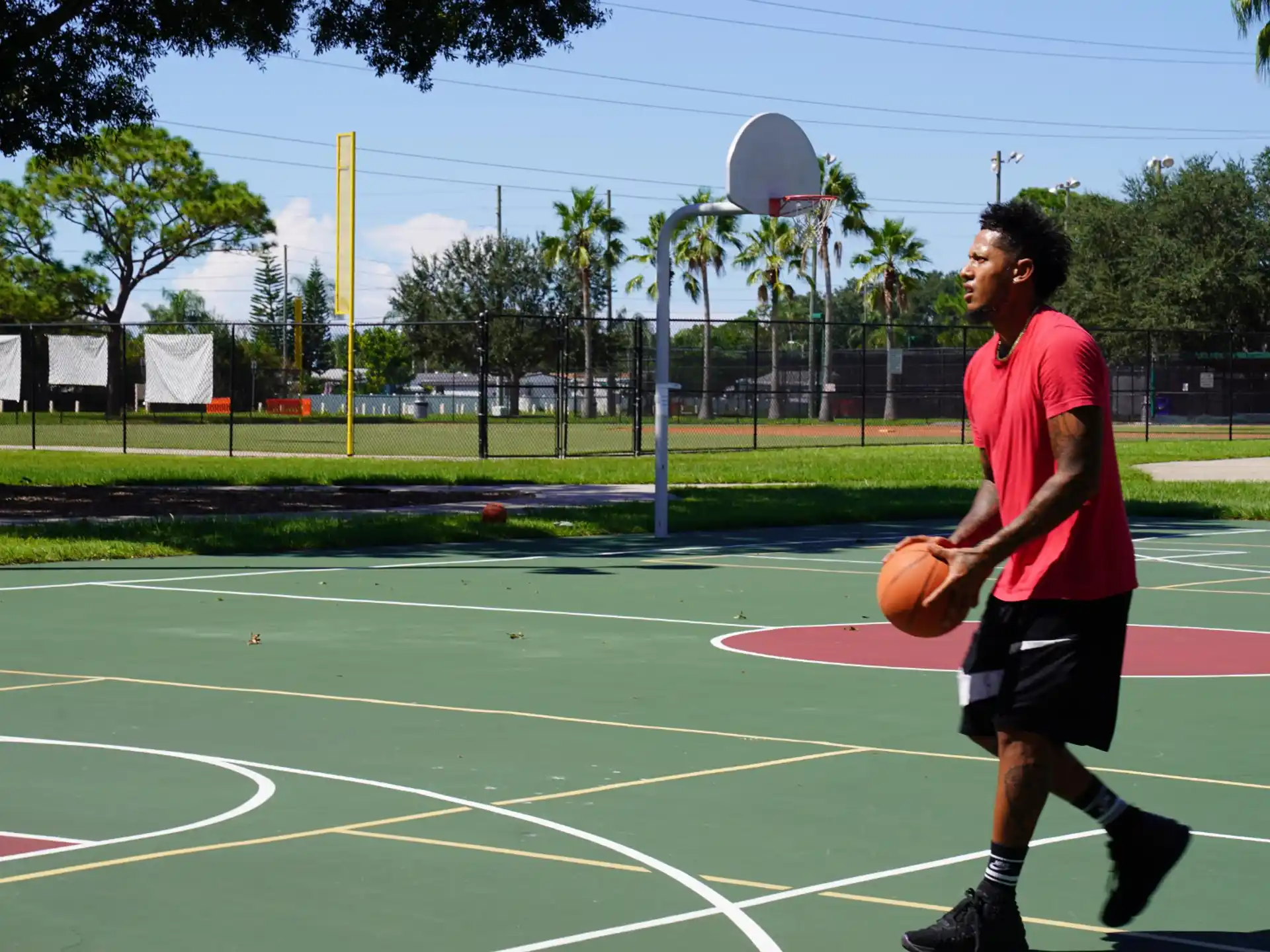 a person holding a basketball