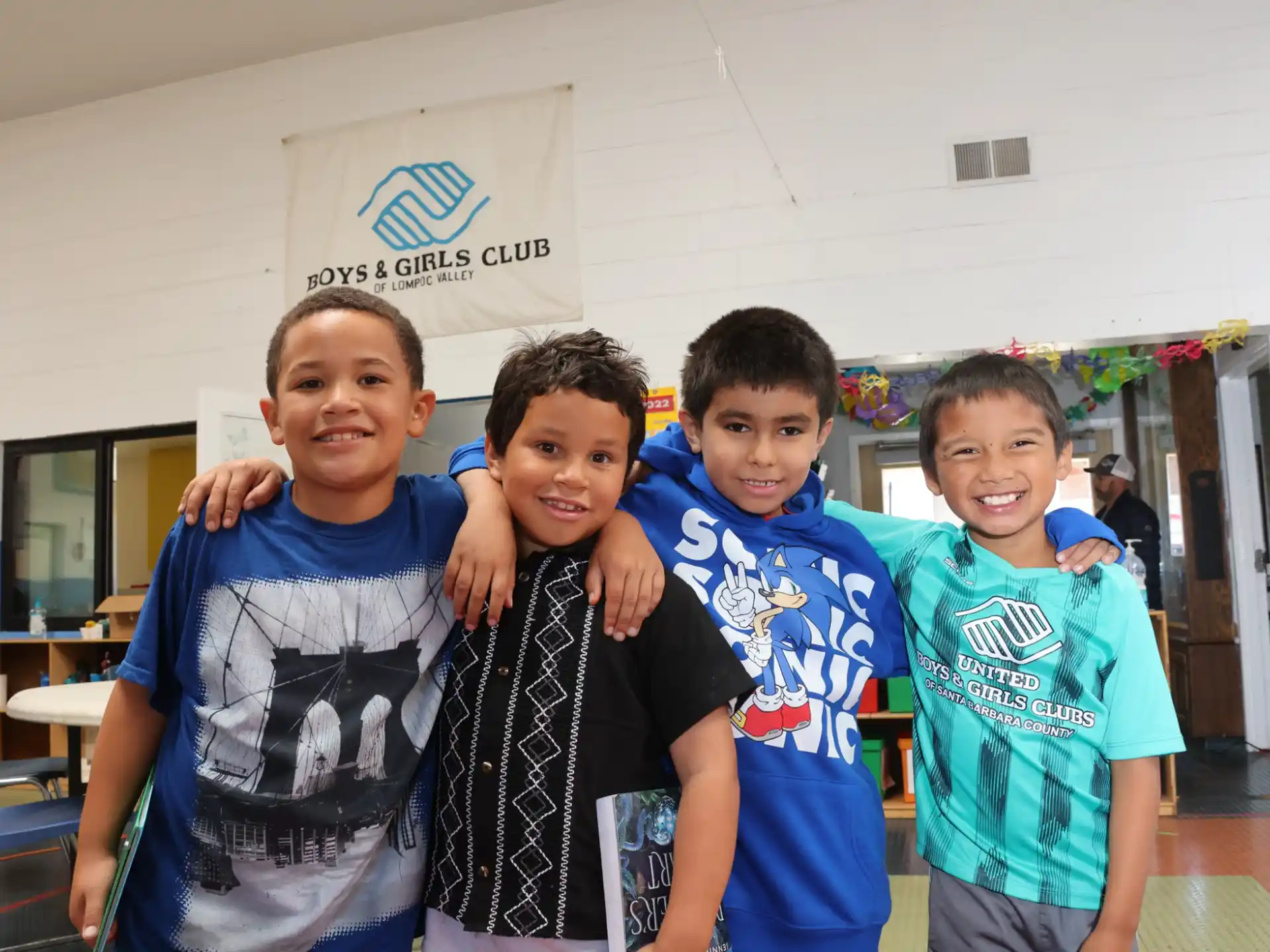 a group of boys posing for a picture