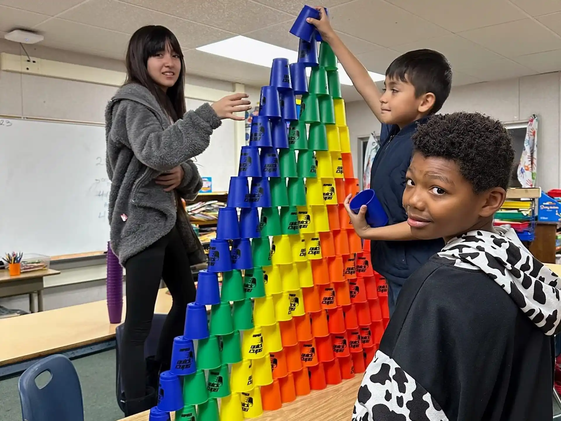 a group of children playing with a toy