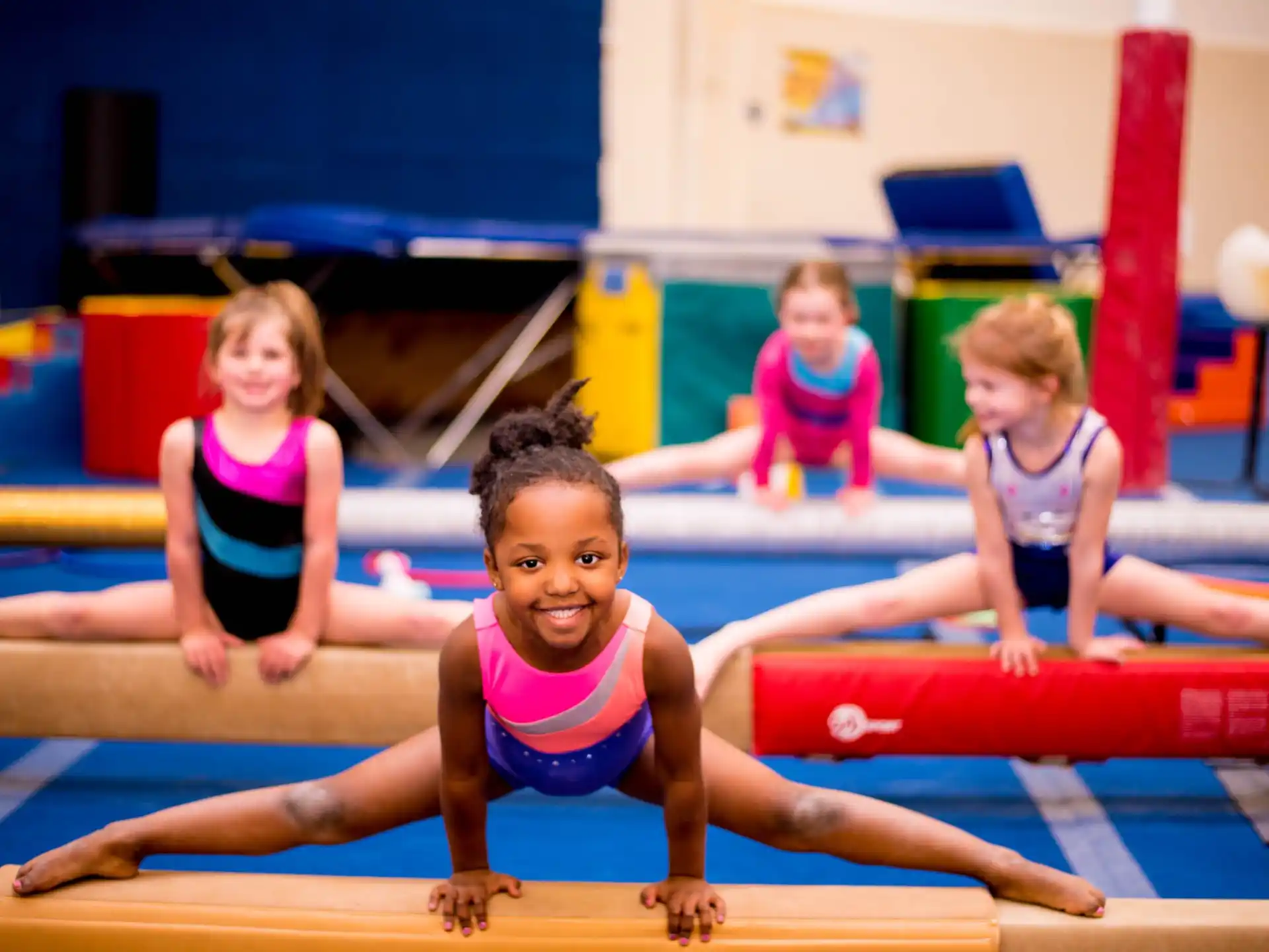 a group of girls in a gym