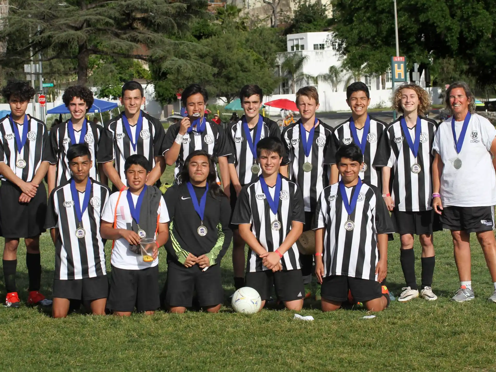 a group of football players posing for a photo