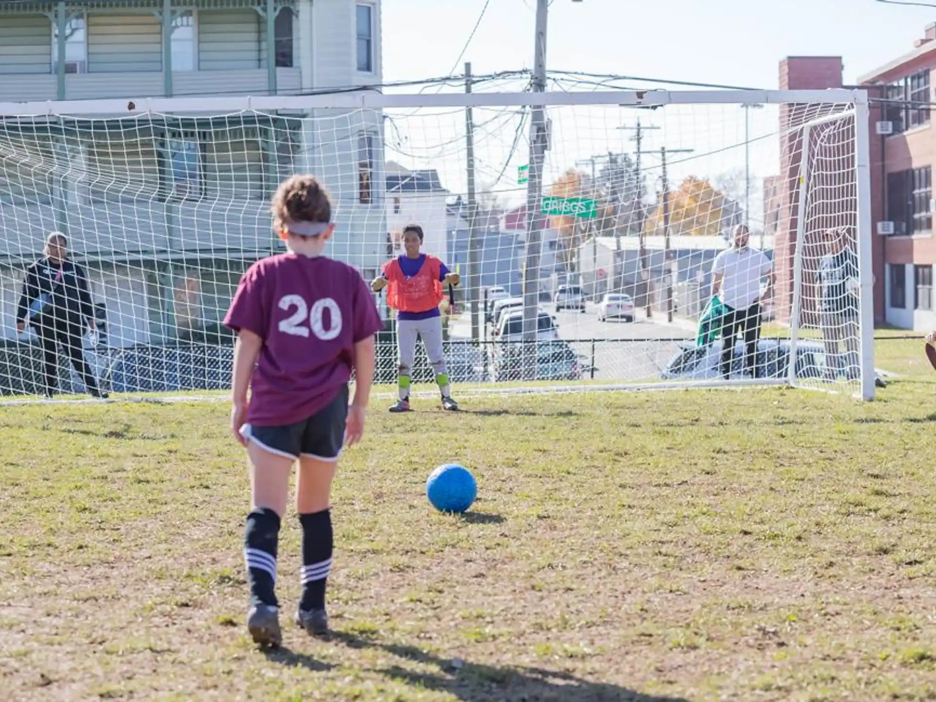 a group of kids playing football