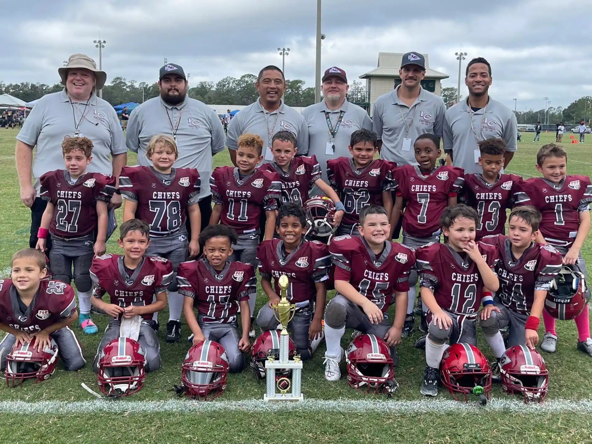 a group of people wearing football gear
