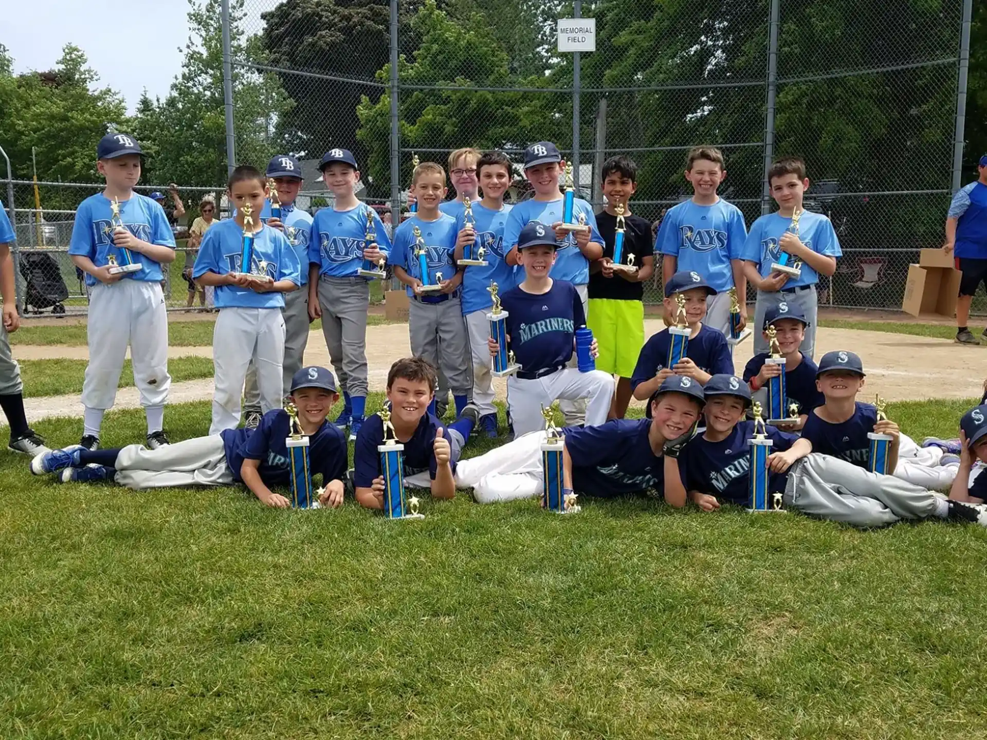 a group of kids in blue uniforms