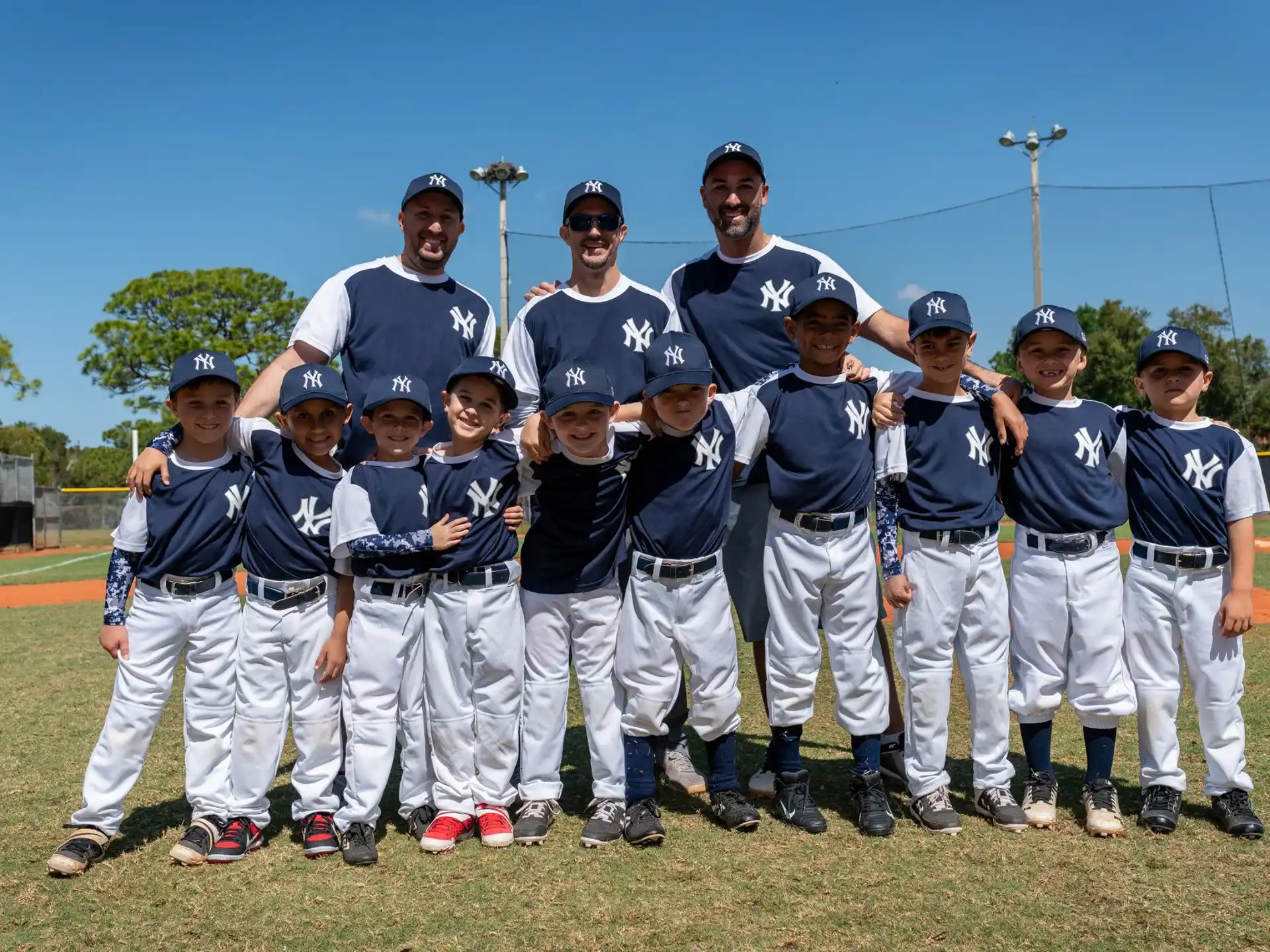 a group of baseball players posing for a photo