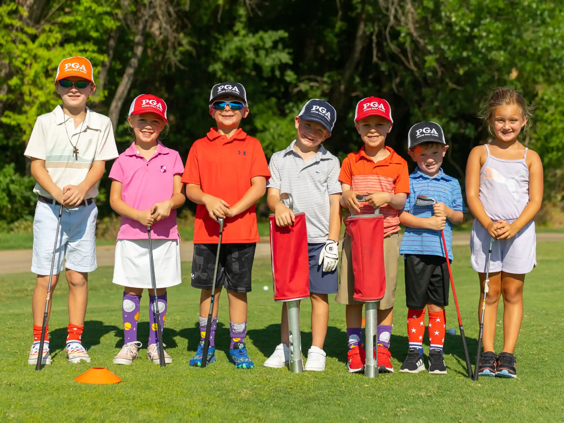 a group of kids posing for a photo