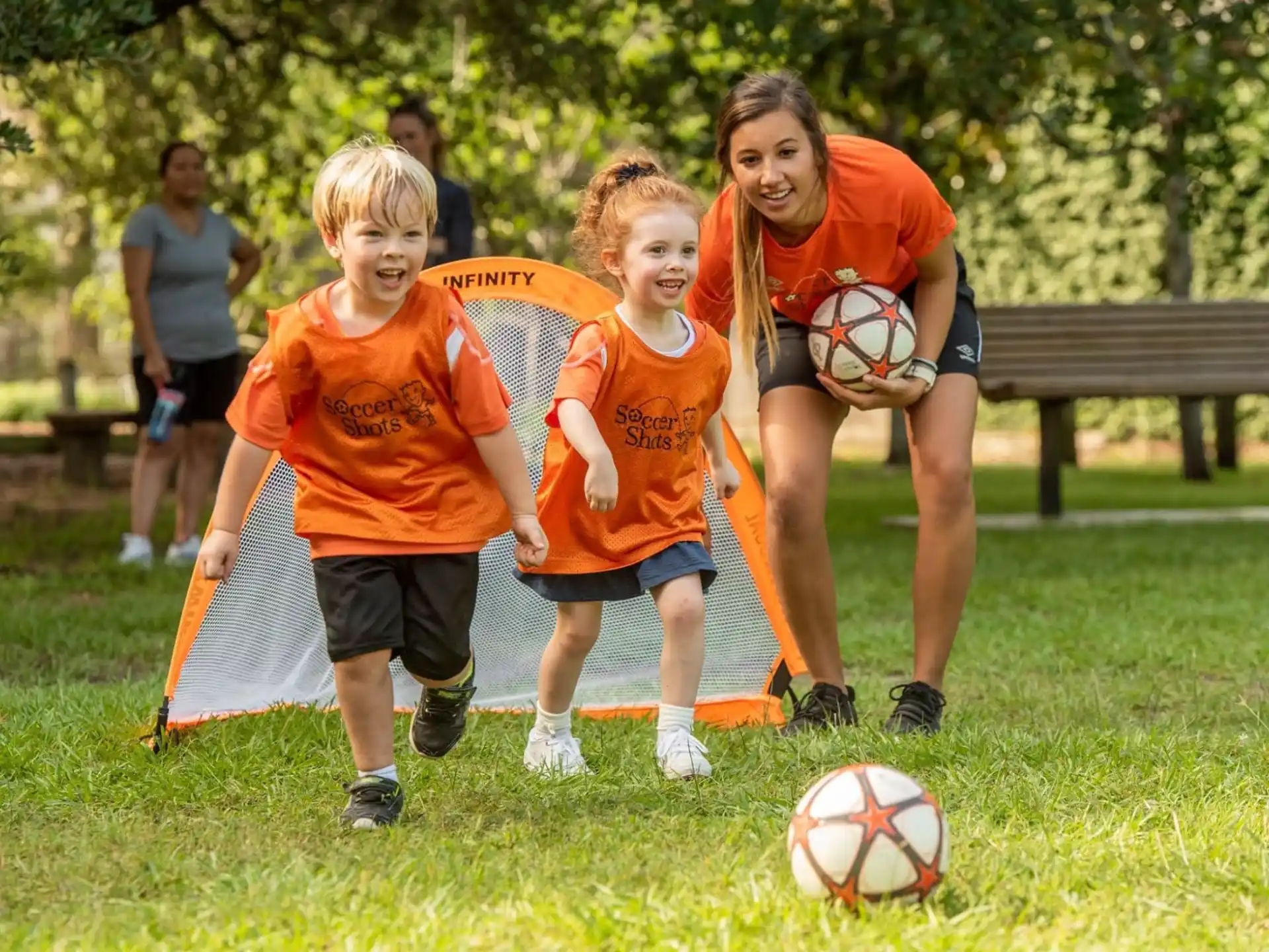 a group of kids playing football