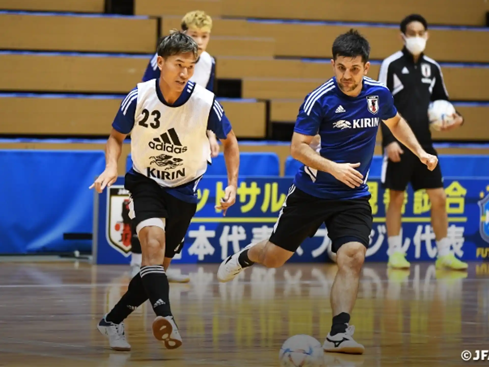 a group of men playing football