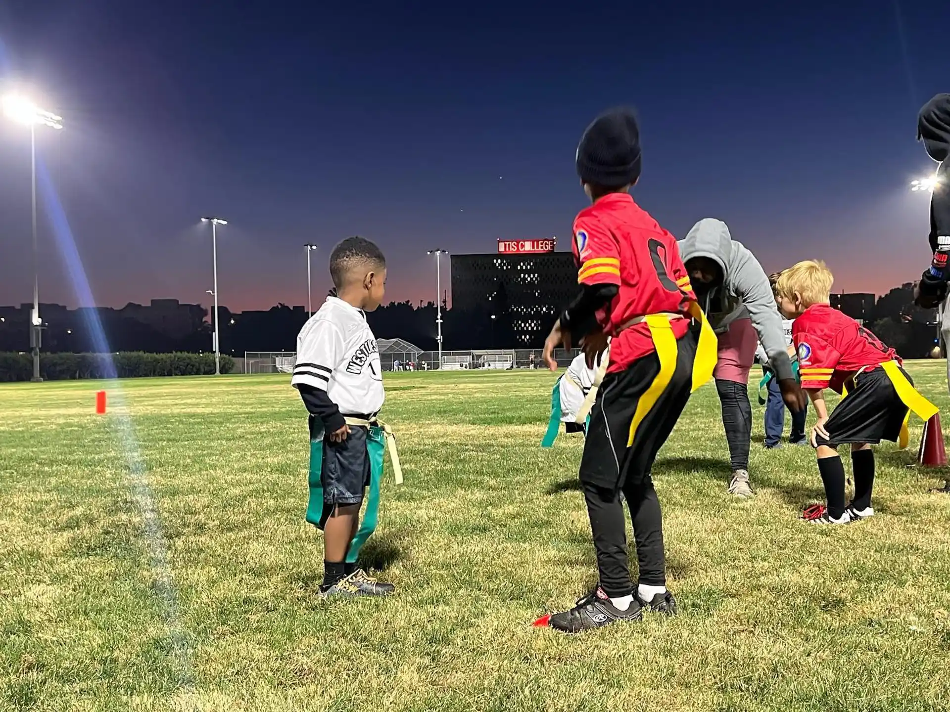 a group of kids on a field