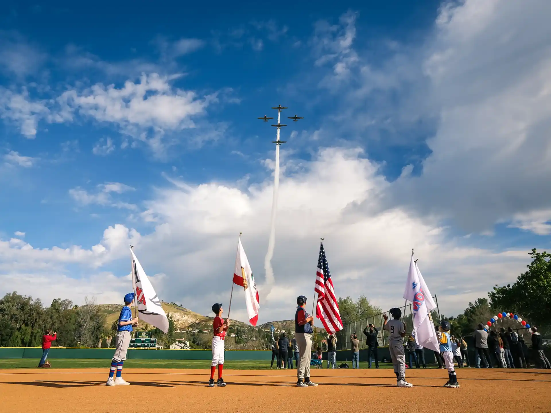 a group of people holding flags