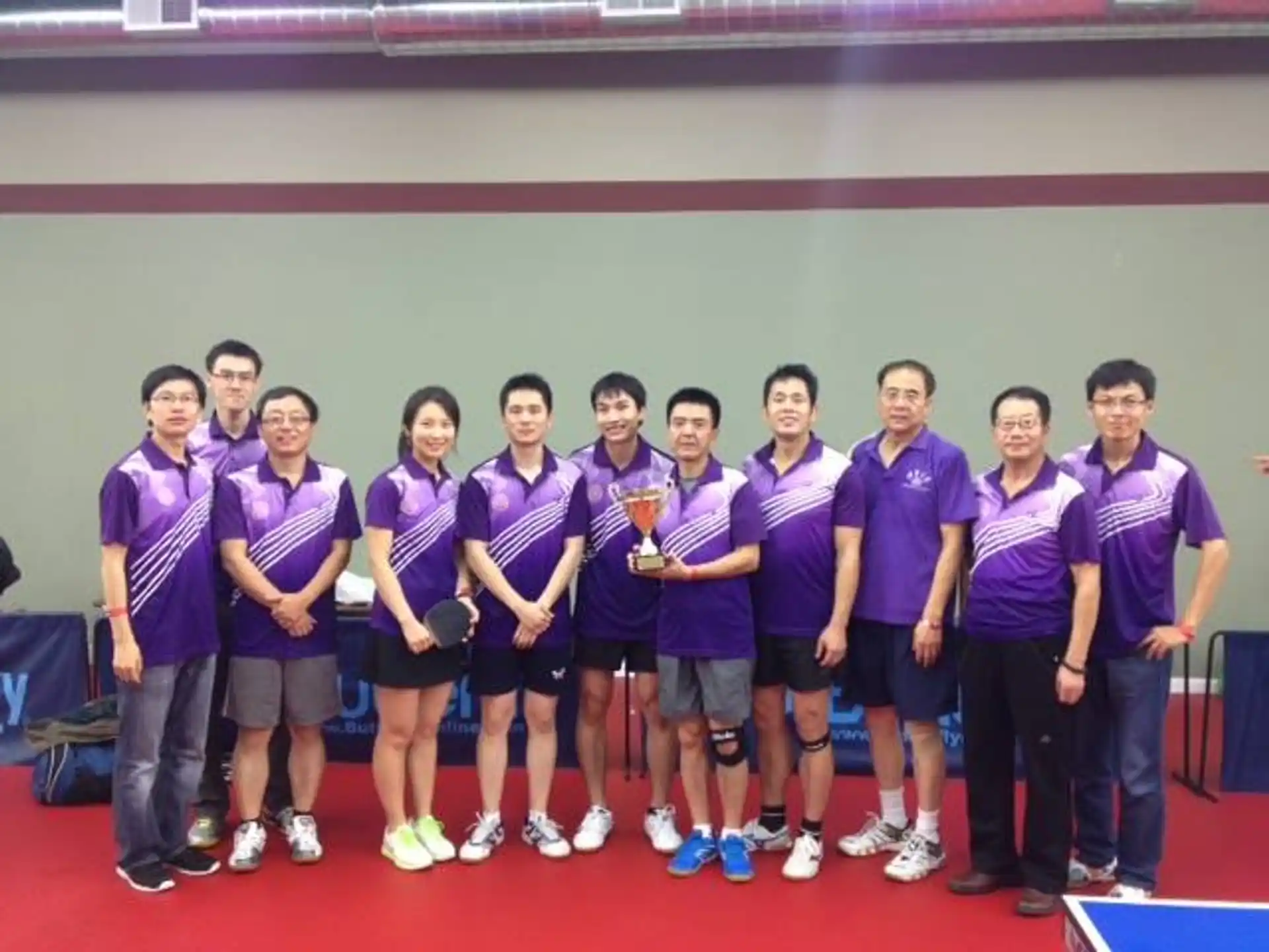 a group of people in matching shirts