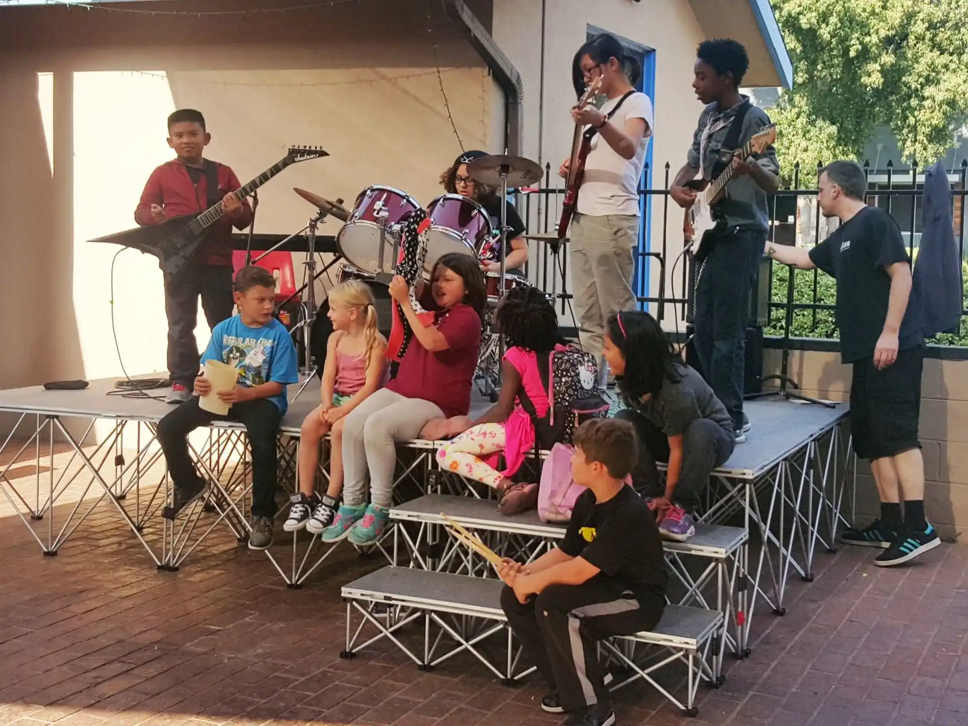 a group of people playing instruments
