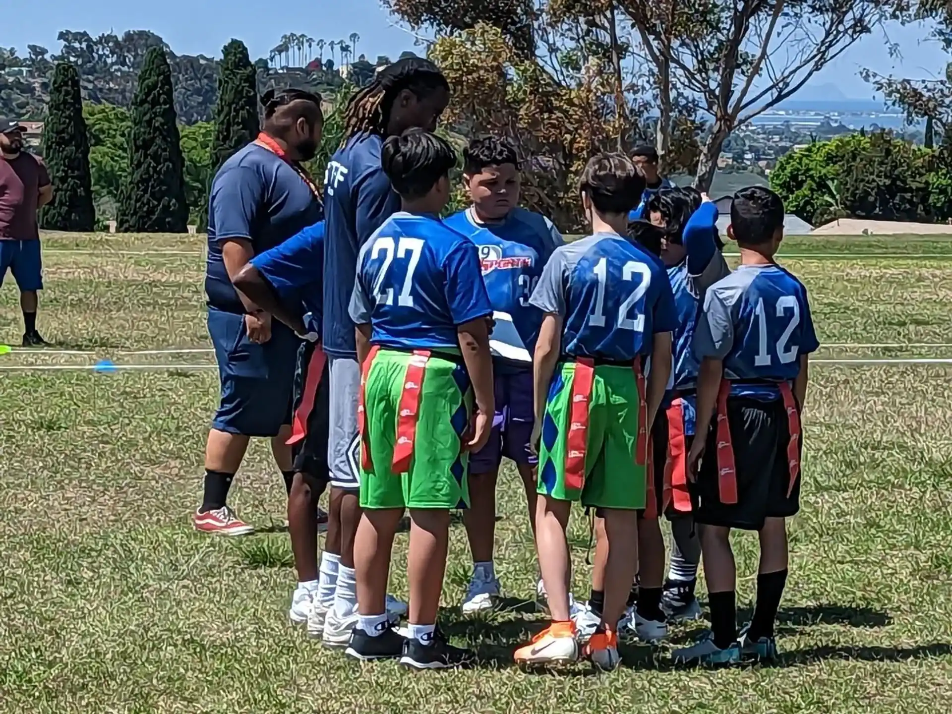 a group of men in sports uniforms