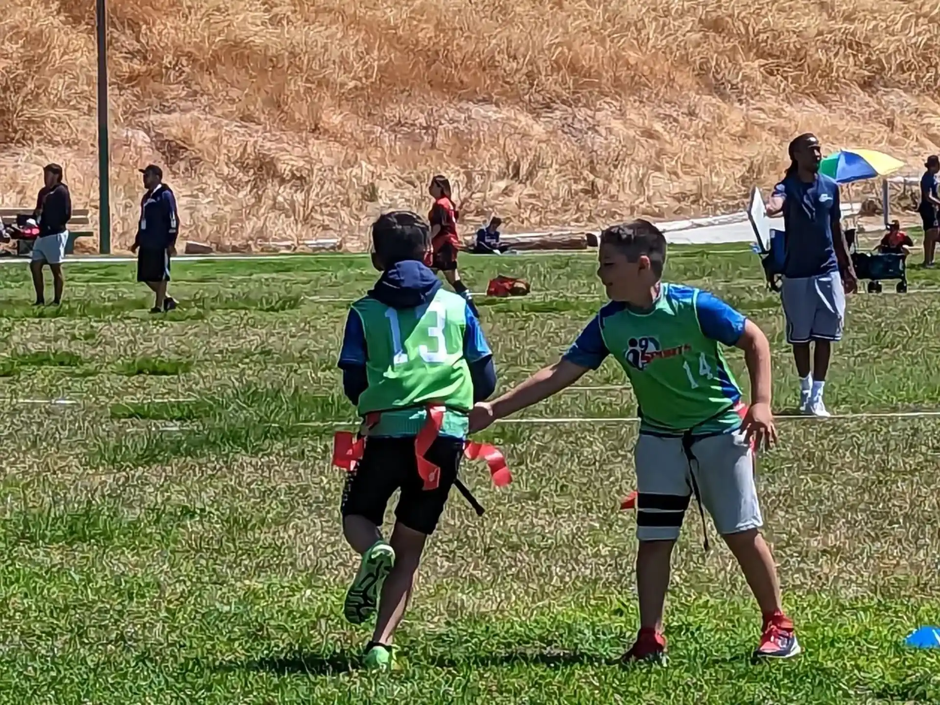 a group of people playing football