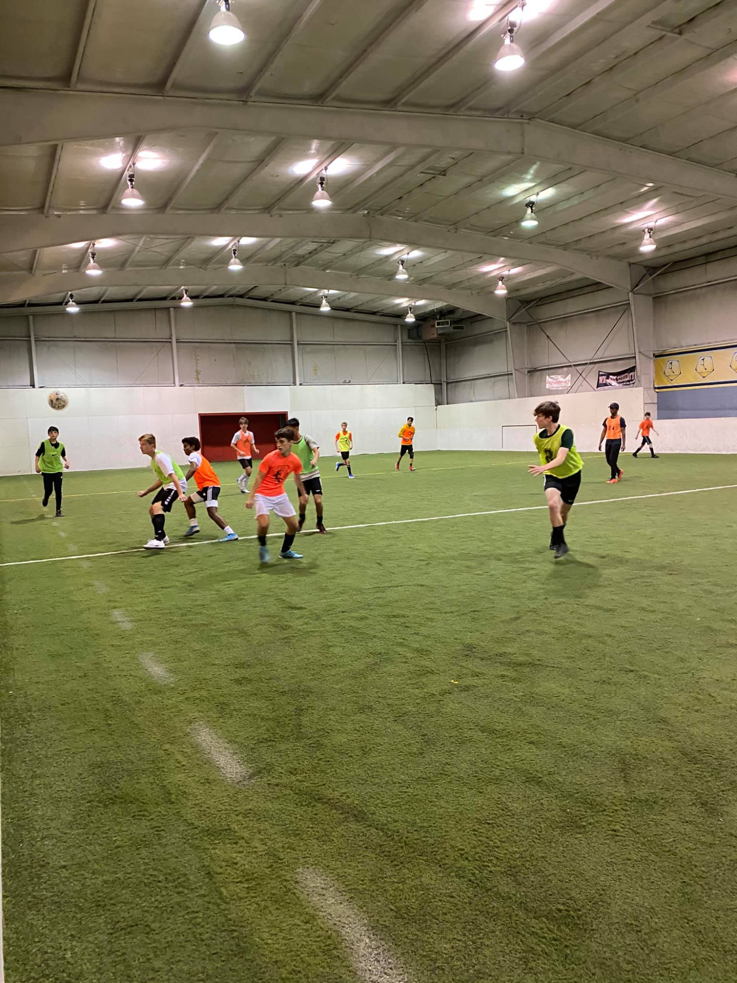 a group of people playing football
