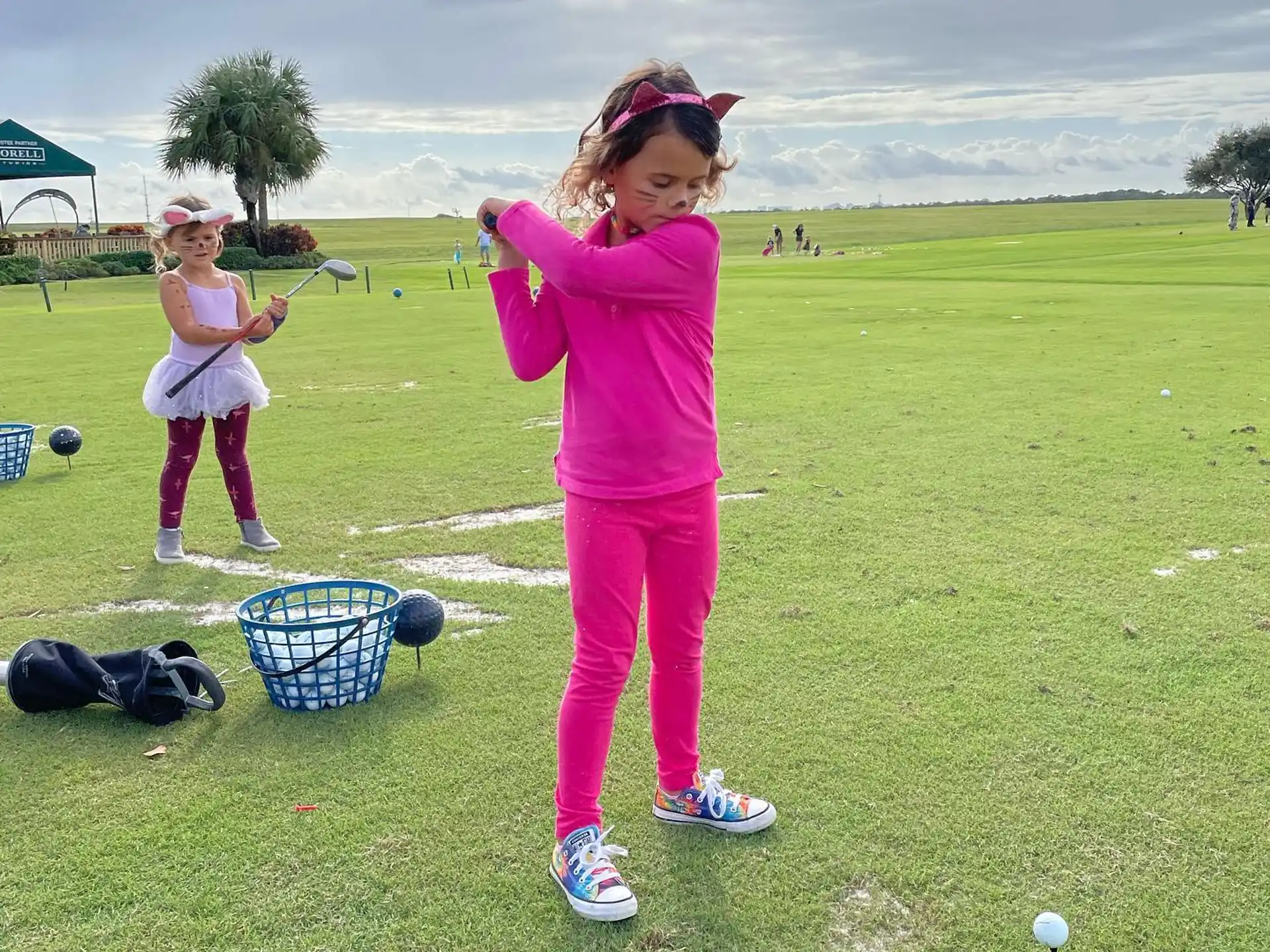a girl playing golf