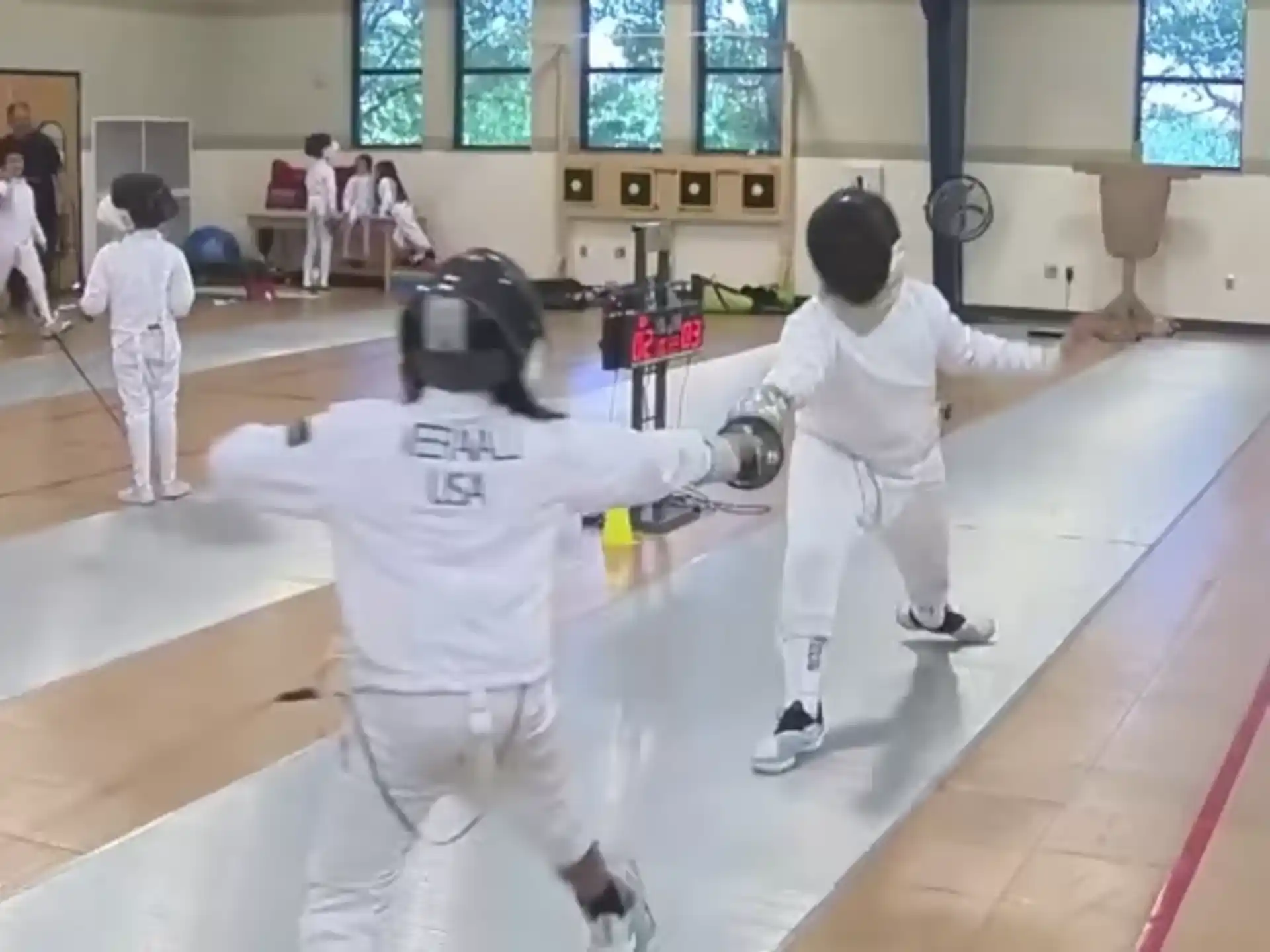 a group of people in karate uniforms
