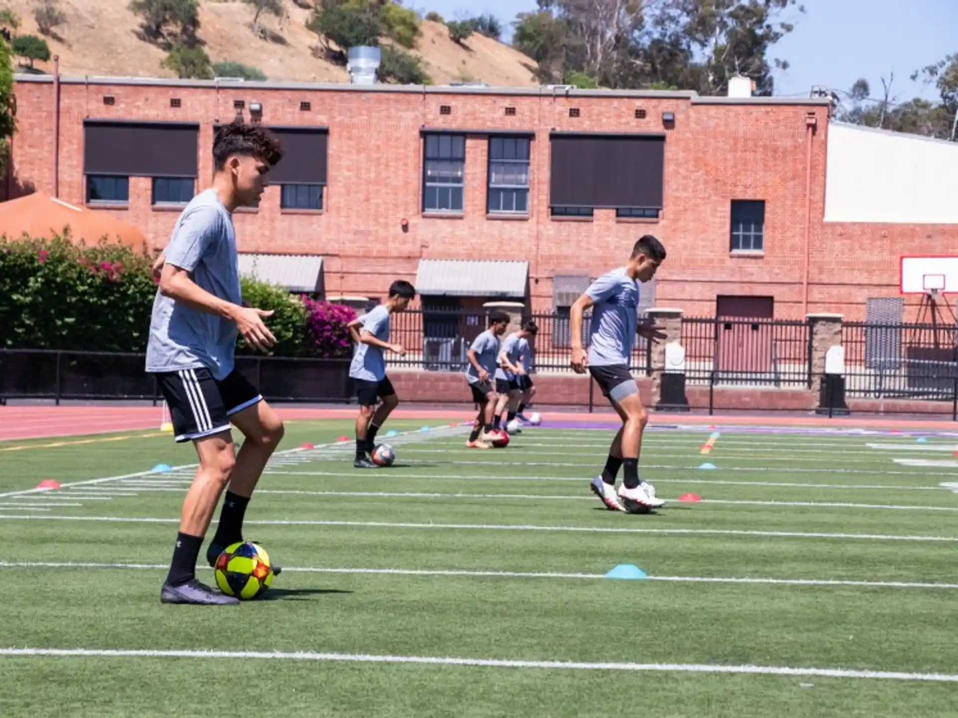 a group of people play football