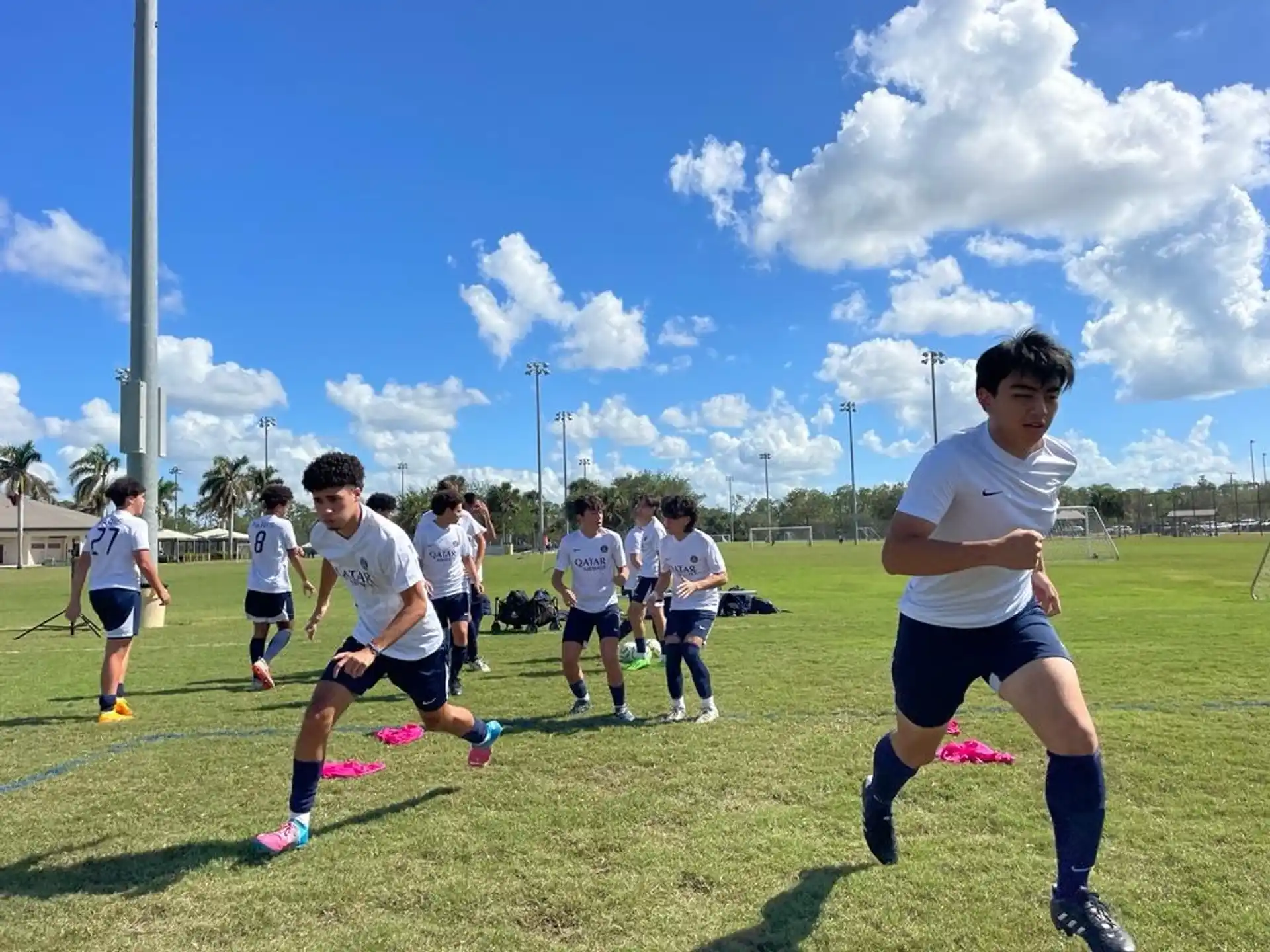 a group of boys playing football
