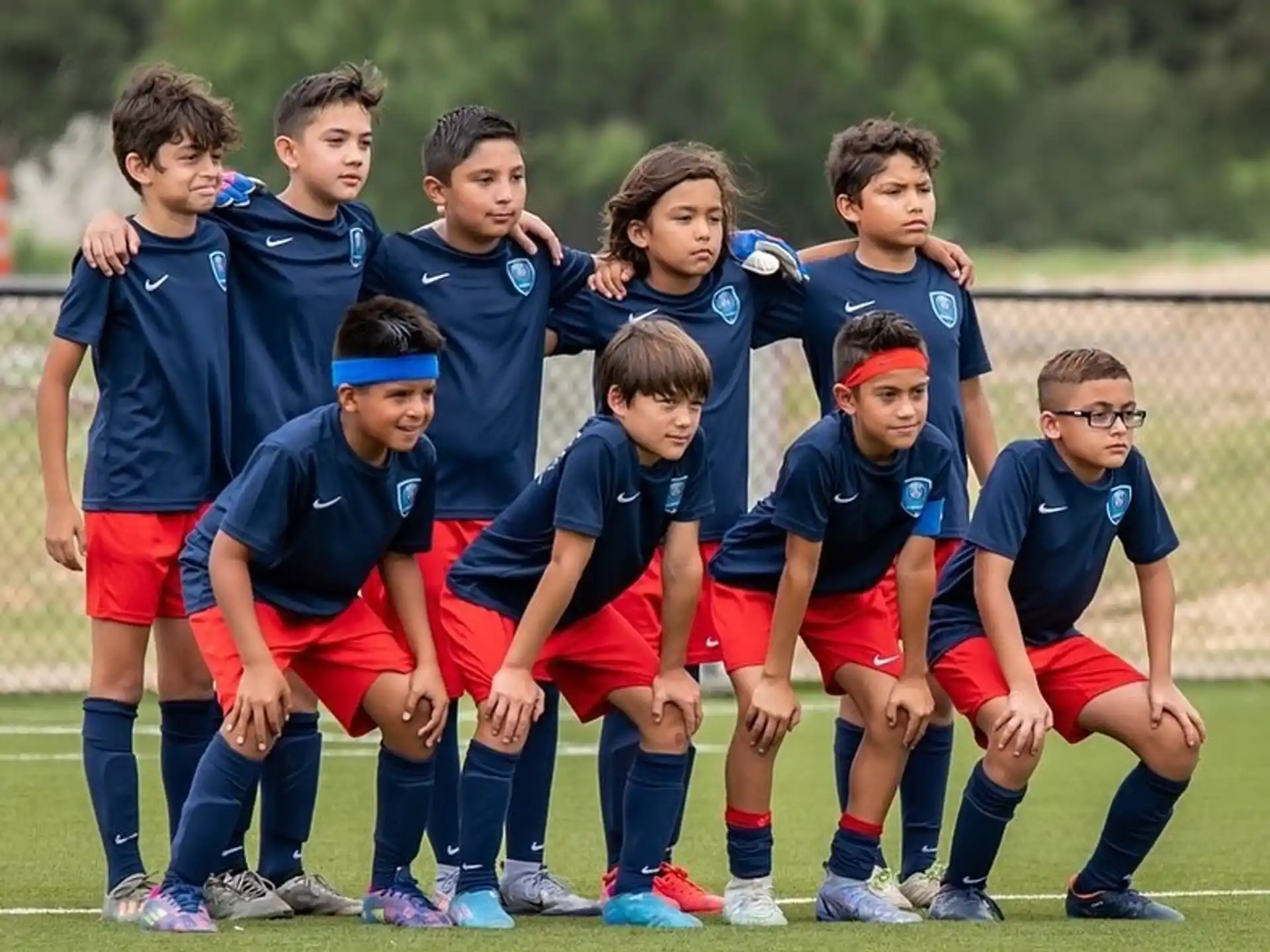 a group of people in sports uniforms