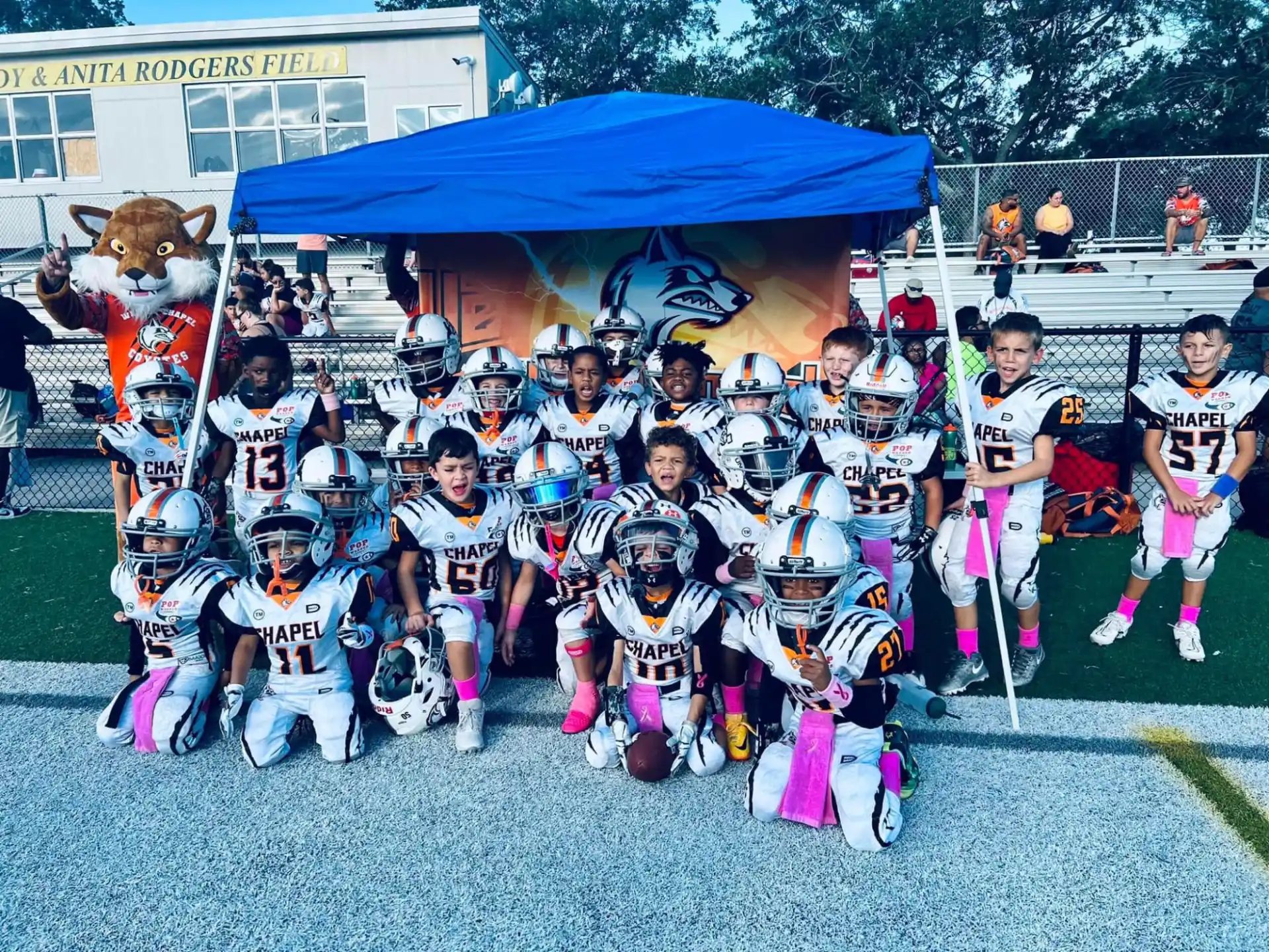 a group of kids wearing helmets