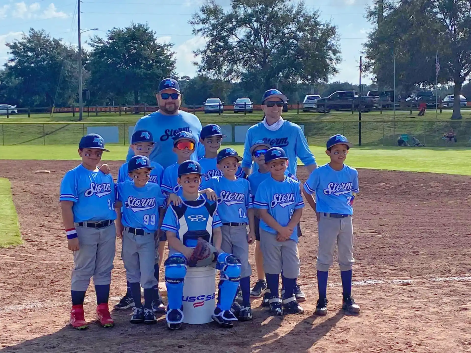 a group of kids in blue uniforms
