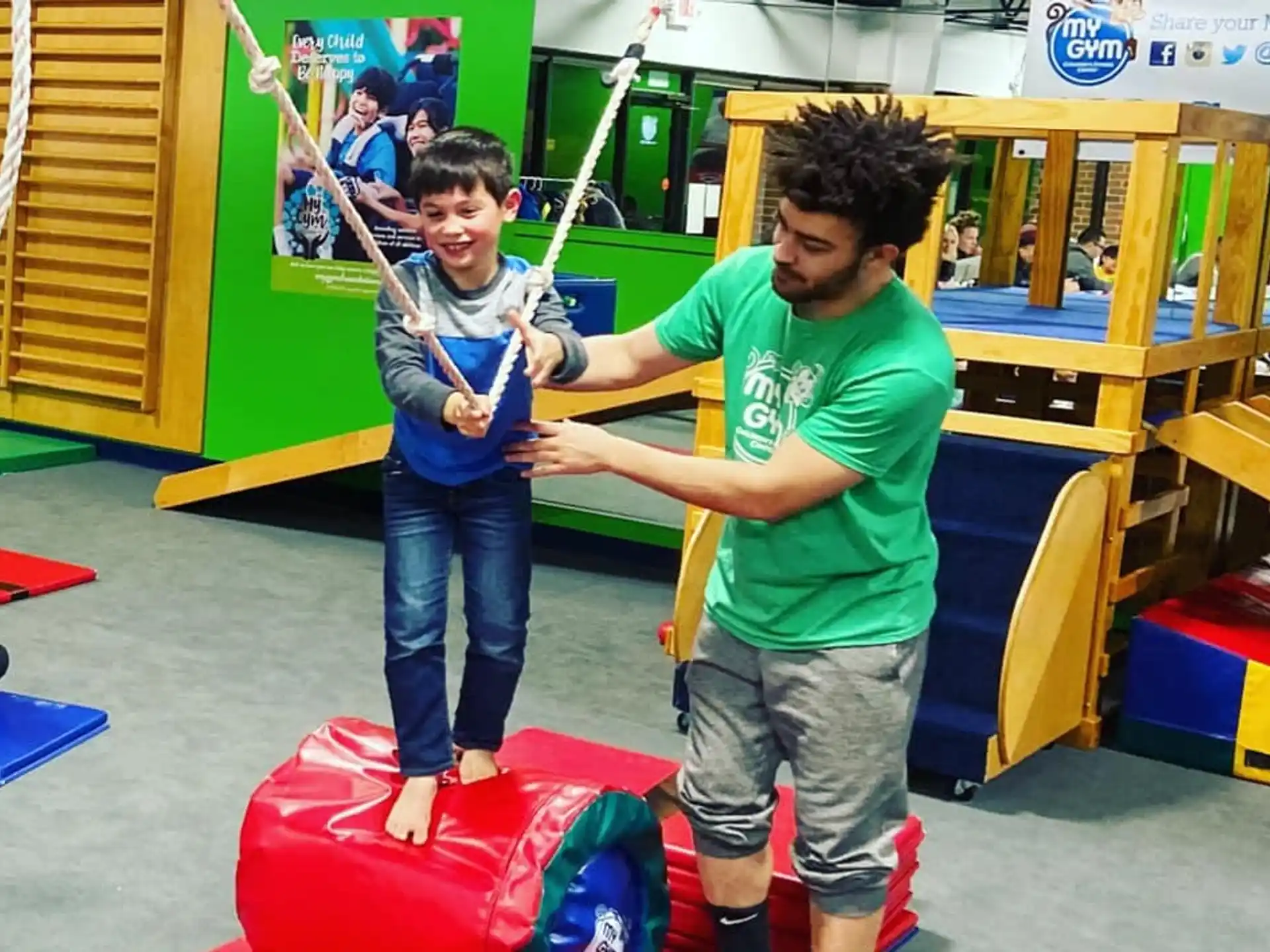 a couple of kids playing with toy swords