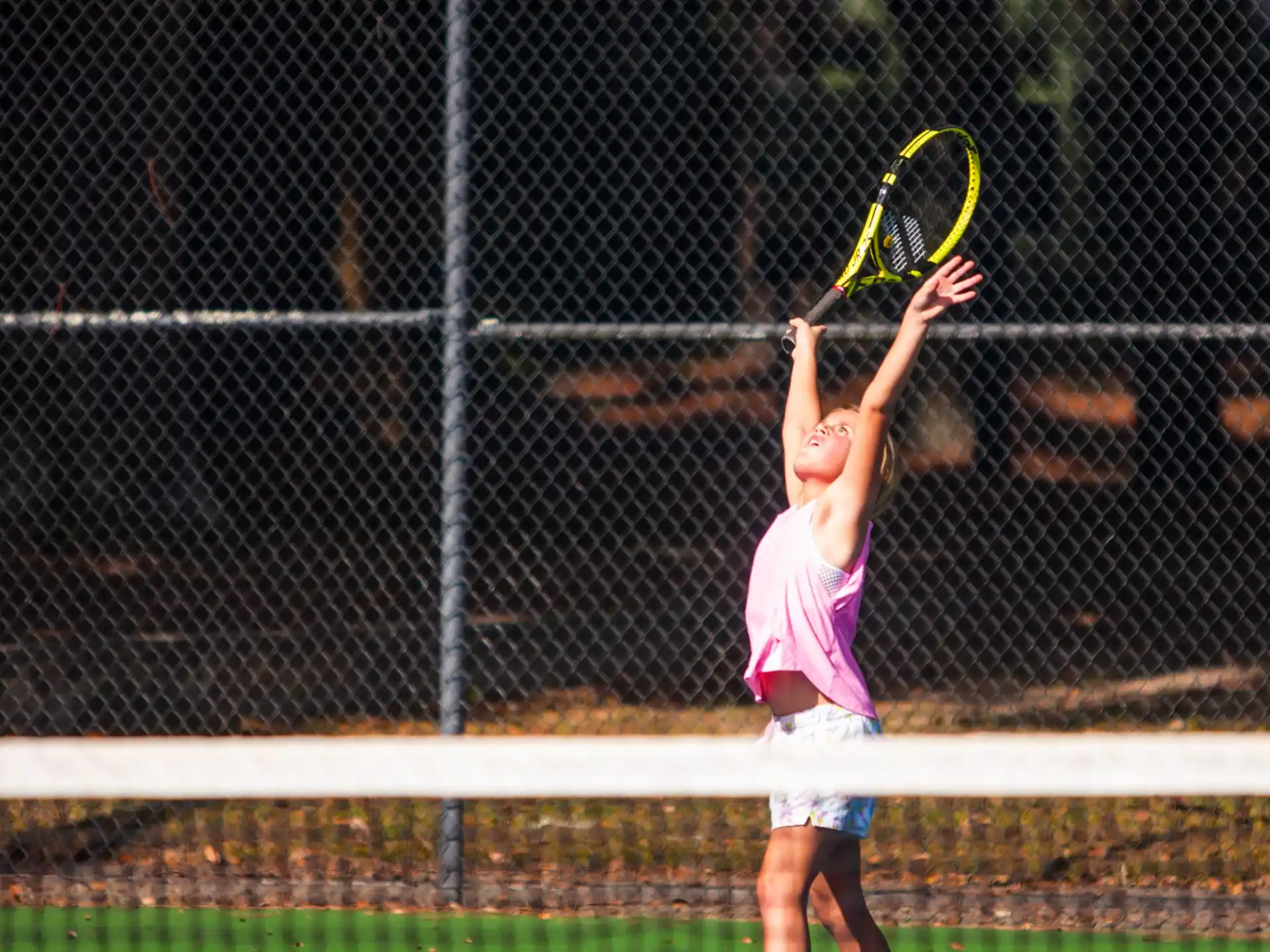 a girl playing tennis