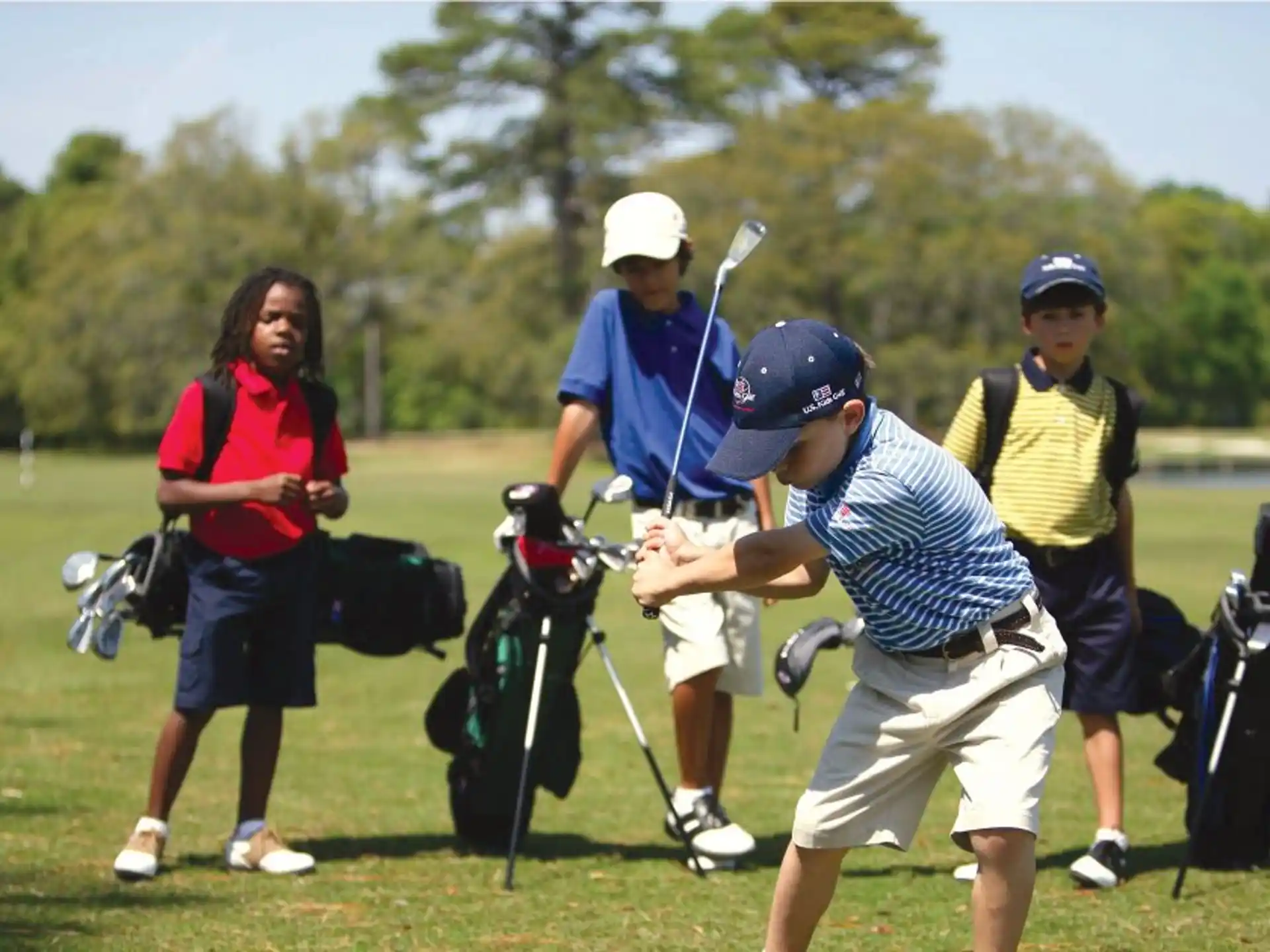 a group of people playing golf