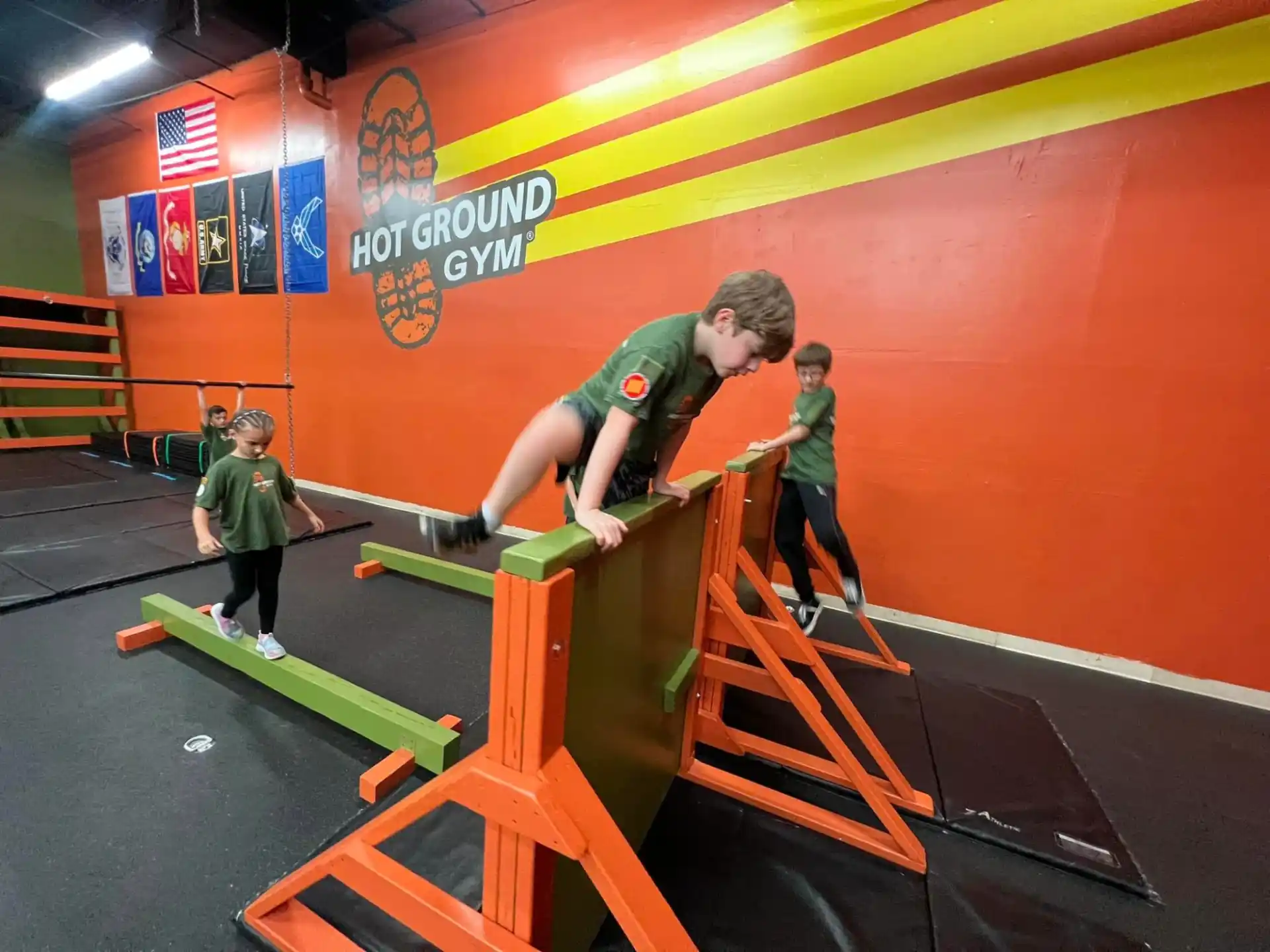 a group of kids playing pool