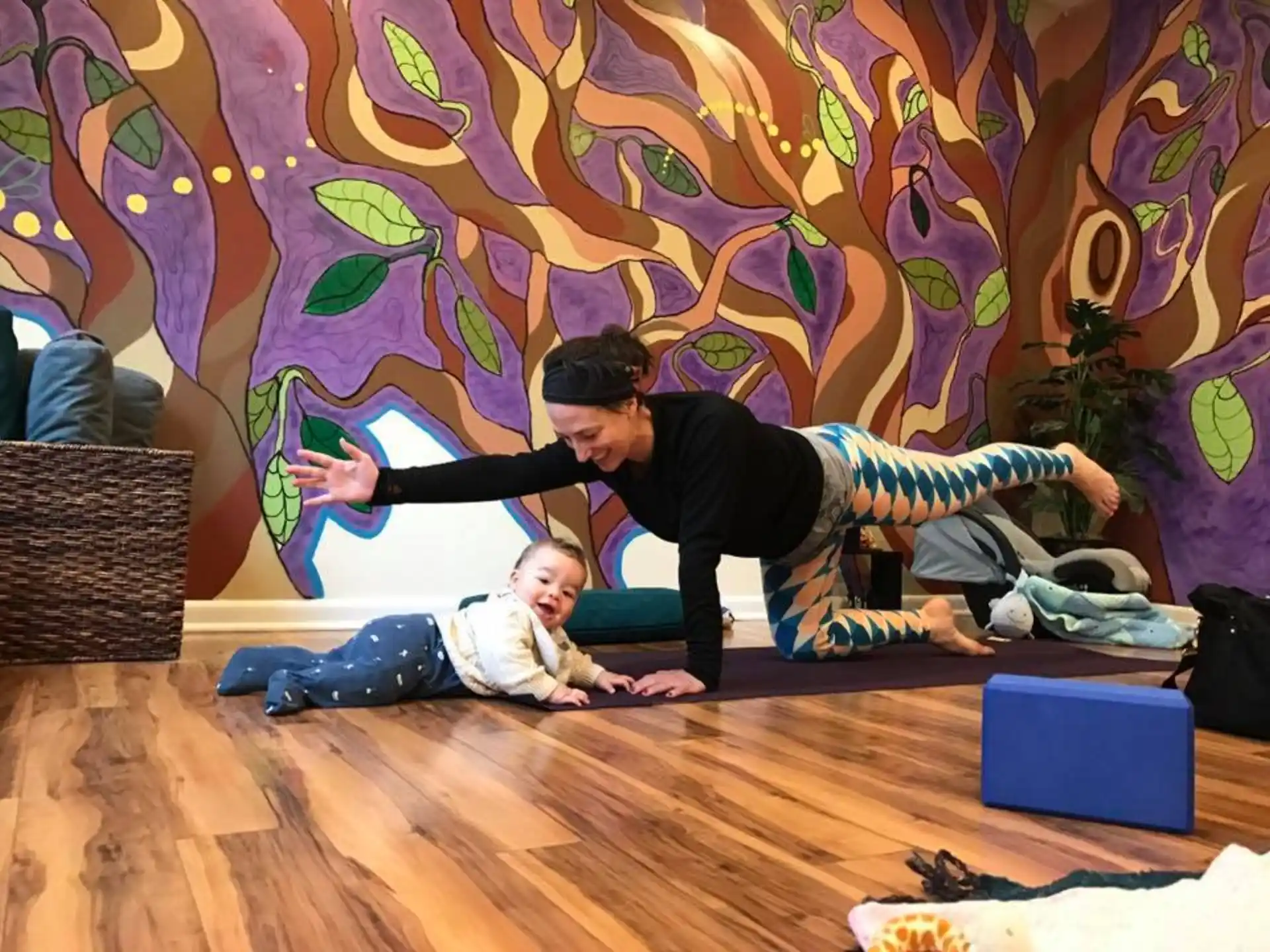 a man and a woman doing yoga
