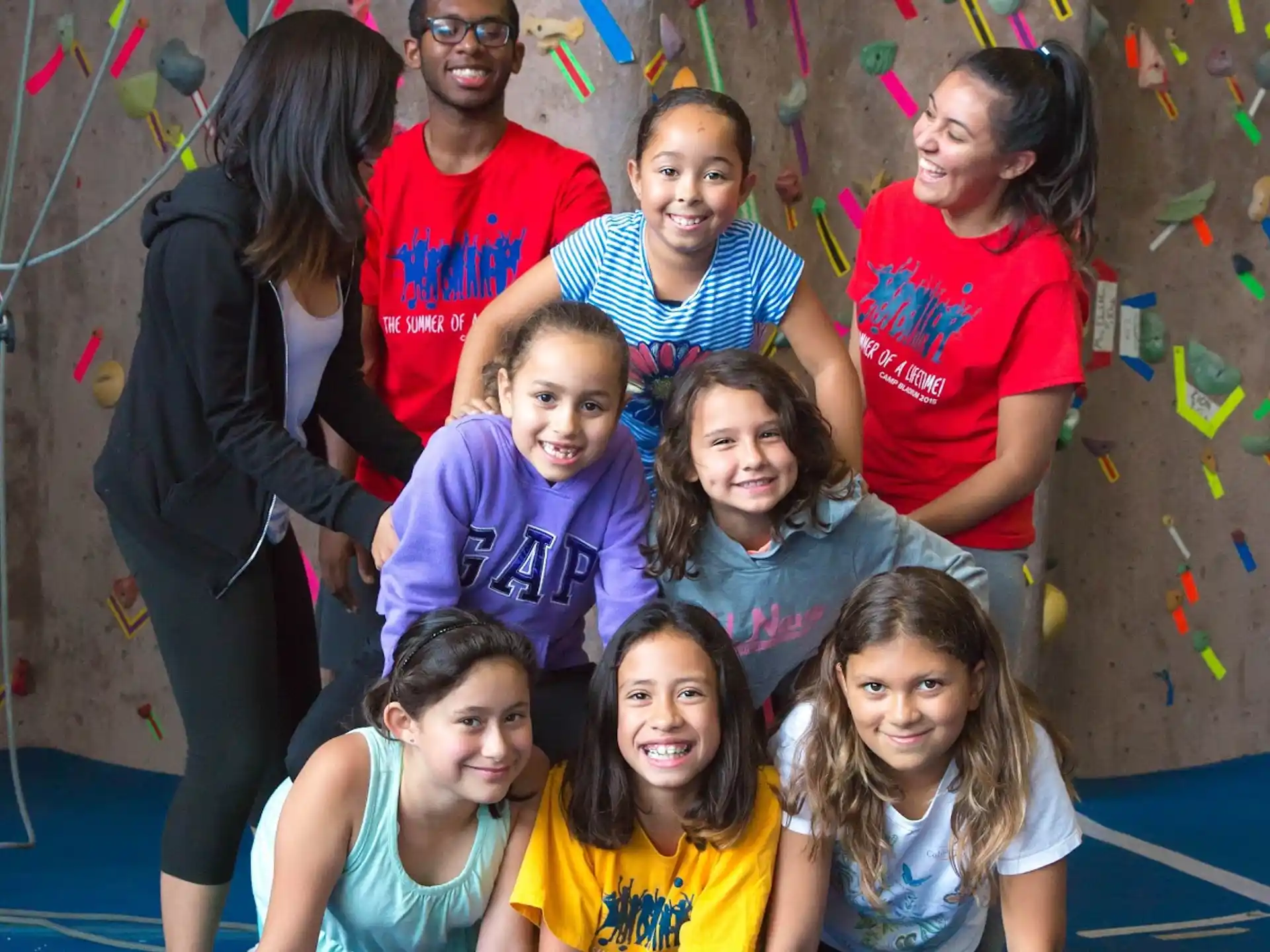 a group of people posing for a photo