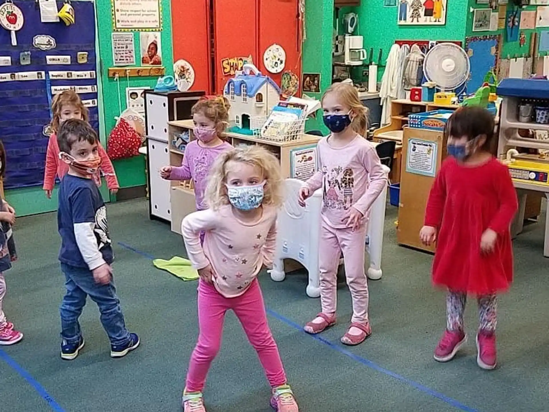 a group of children in a classroom