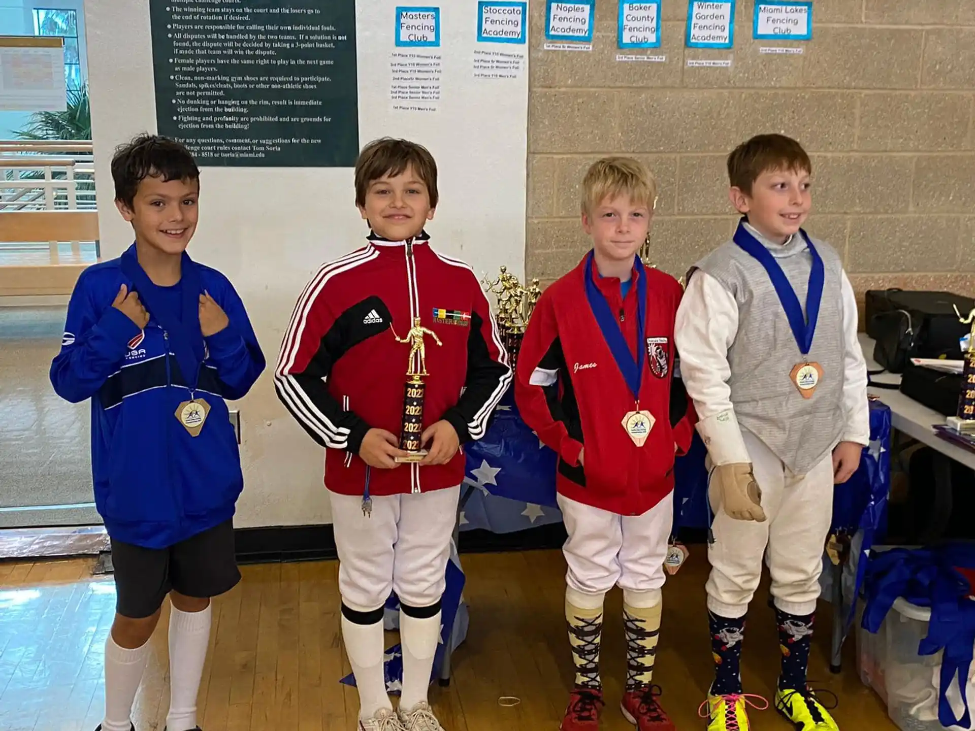 a group of boys wearing medals