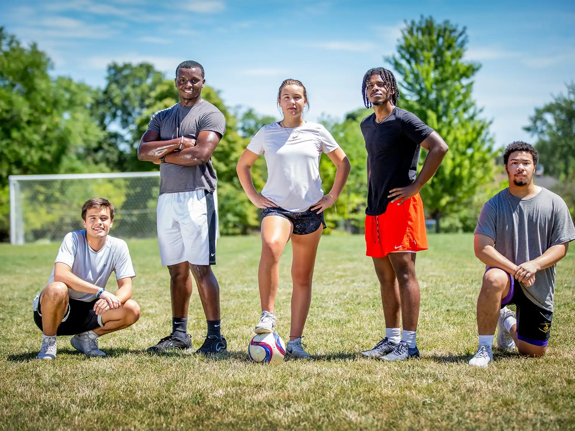 a group of people playing football