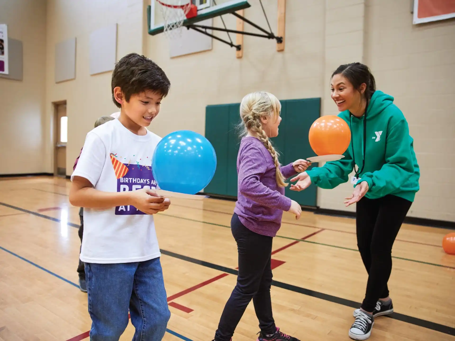 a group of people holding balloons