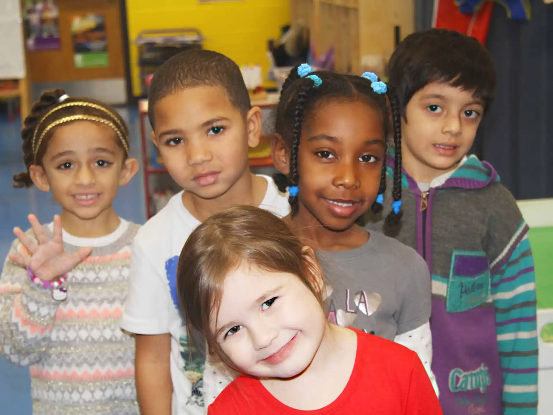 a group of children posing for a photo
