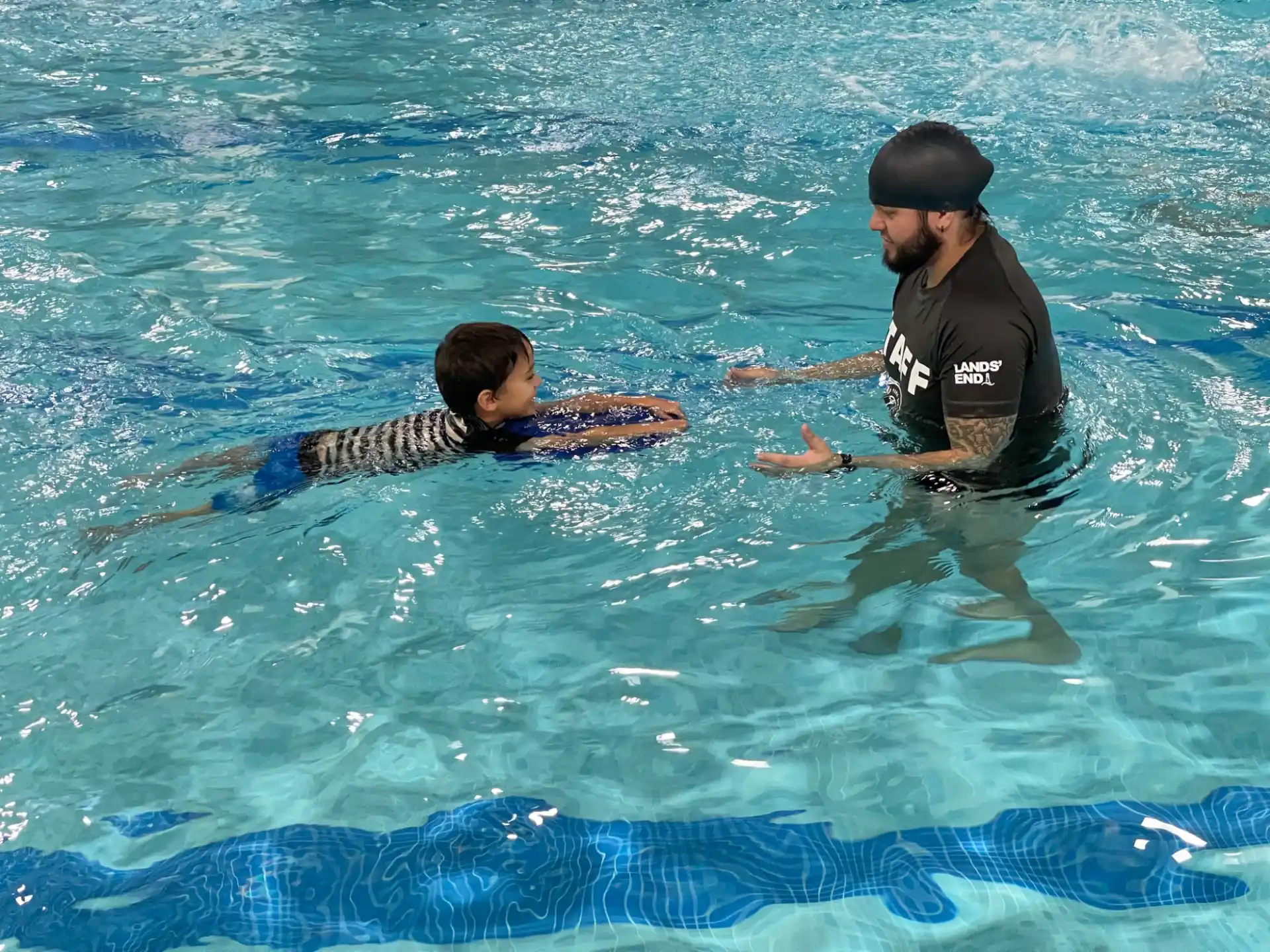 a man and a boy in the water