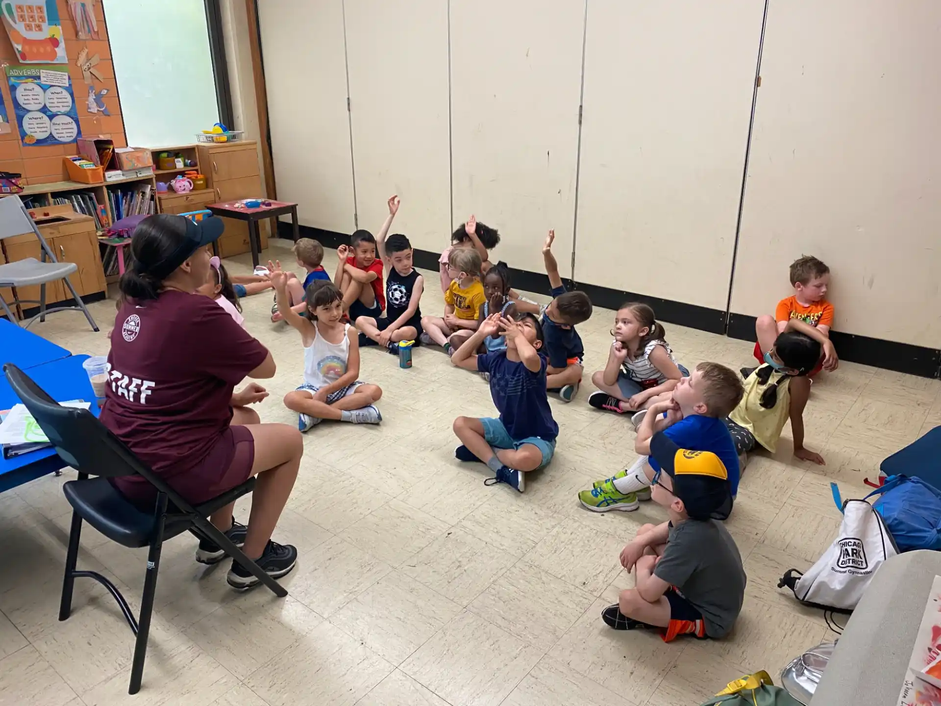 a person teaching children in a classroom