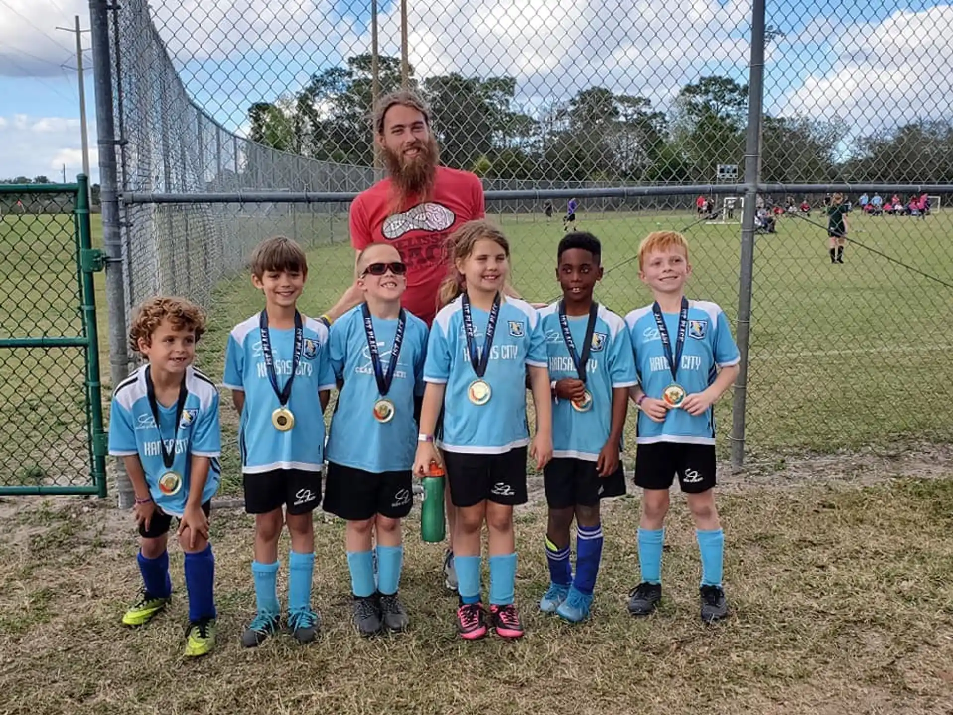 a group of kids posing for a photo