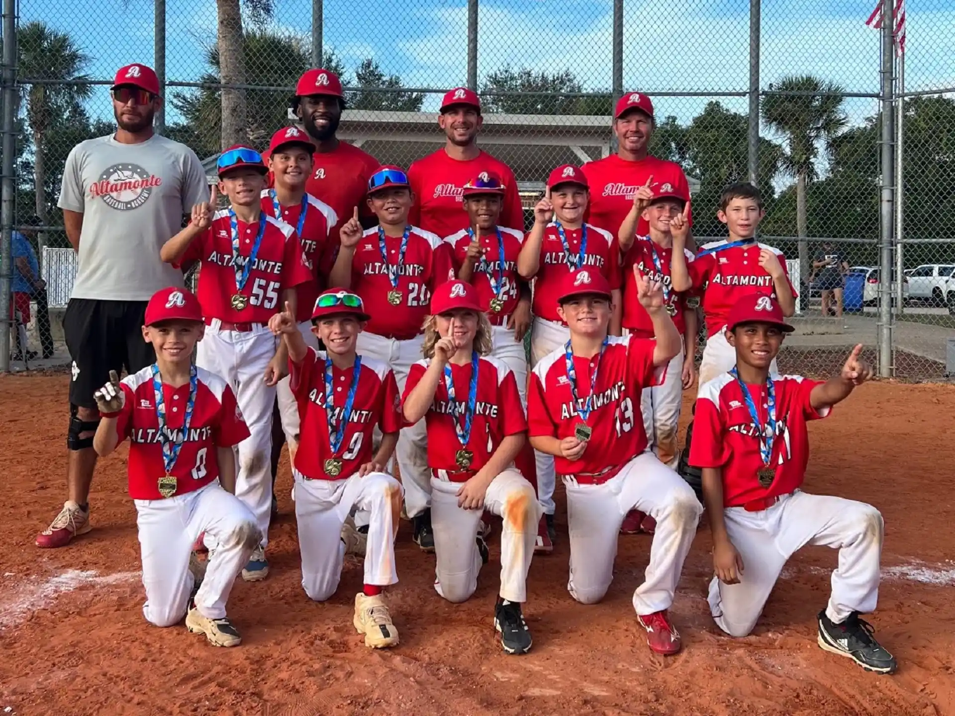 a group of baseball players posing for a photo