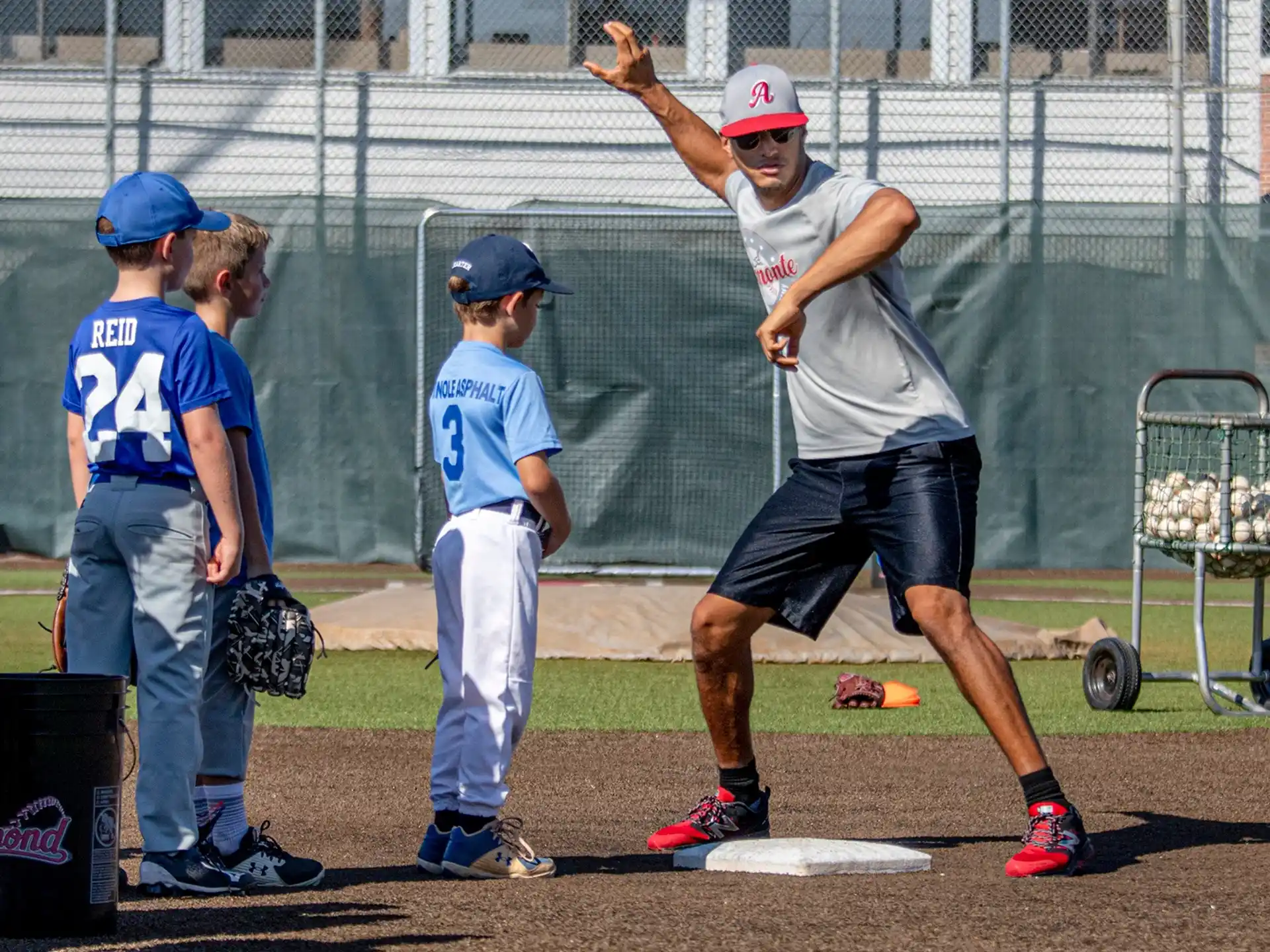 a person throwing a baseball