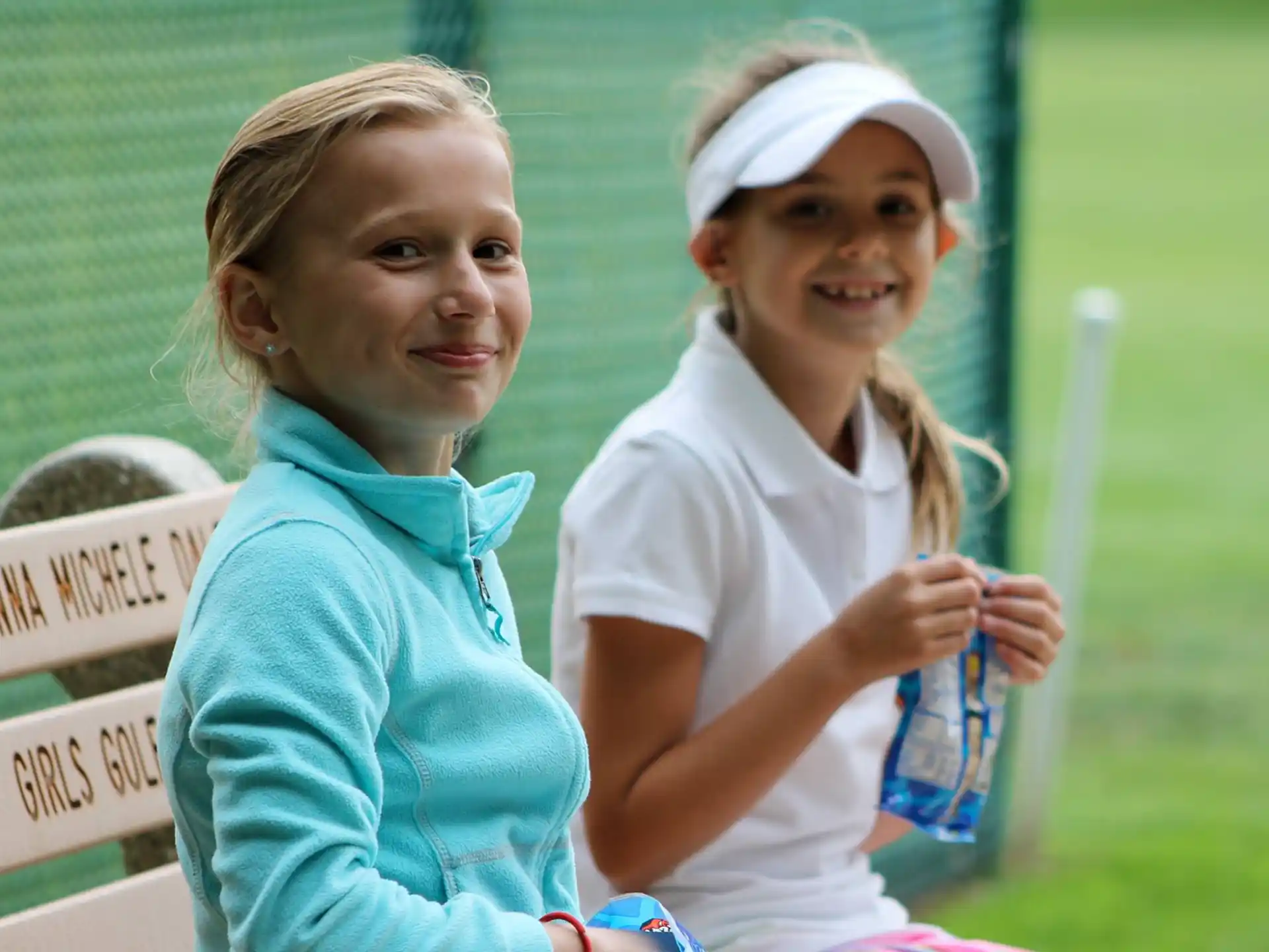 a couple of girls smiling