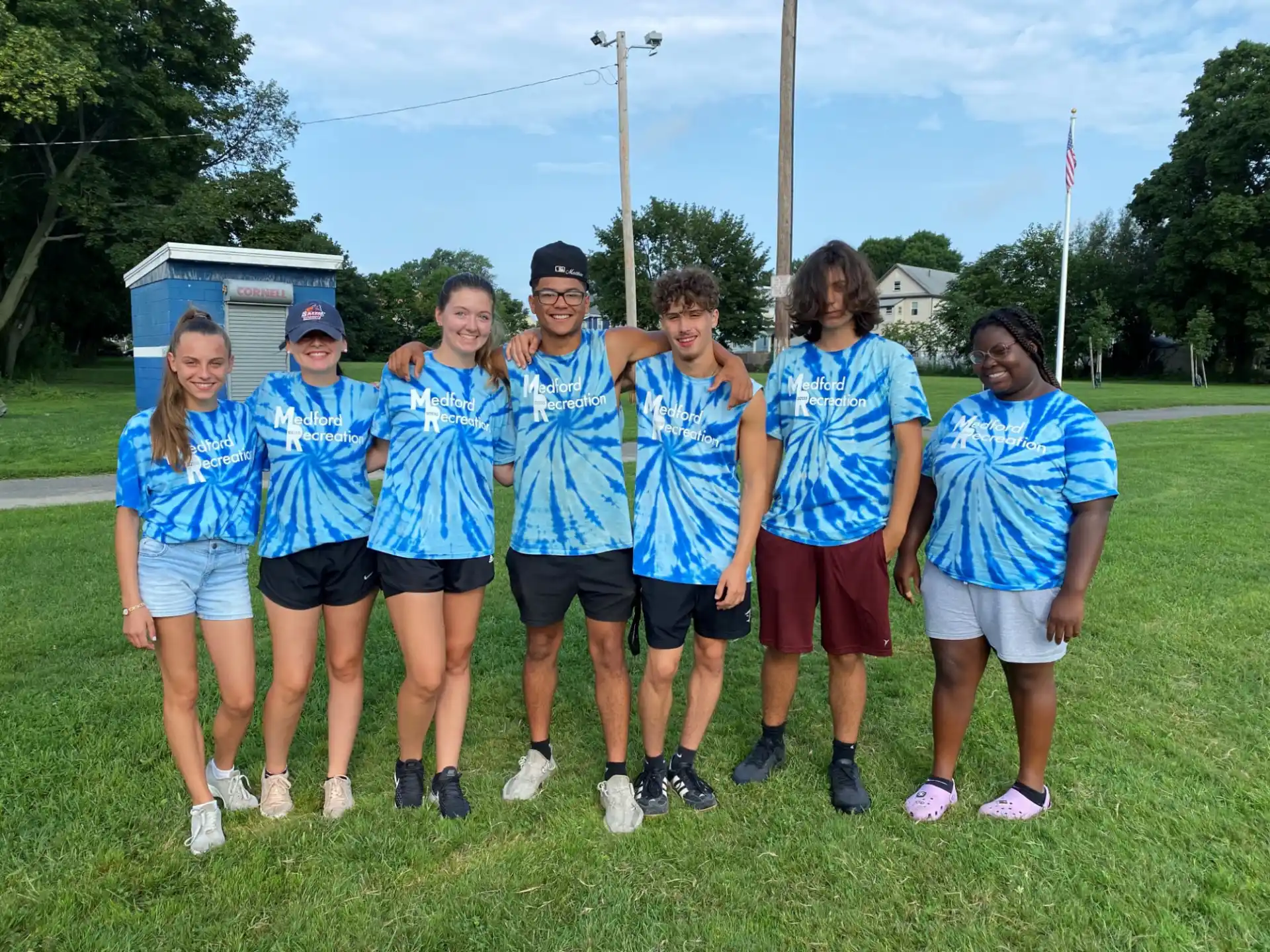 a group of people wearing matching t-shirts
