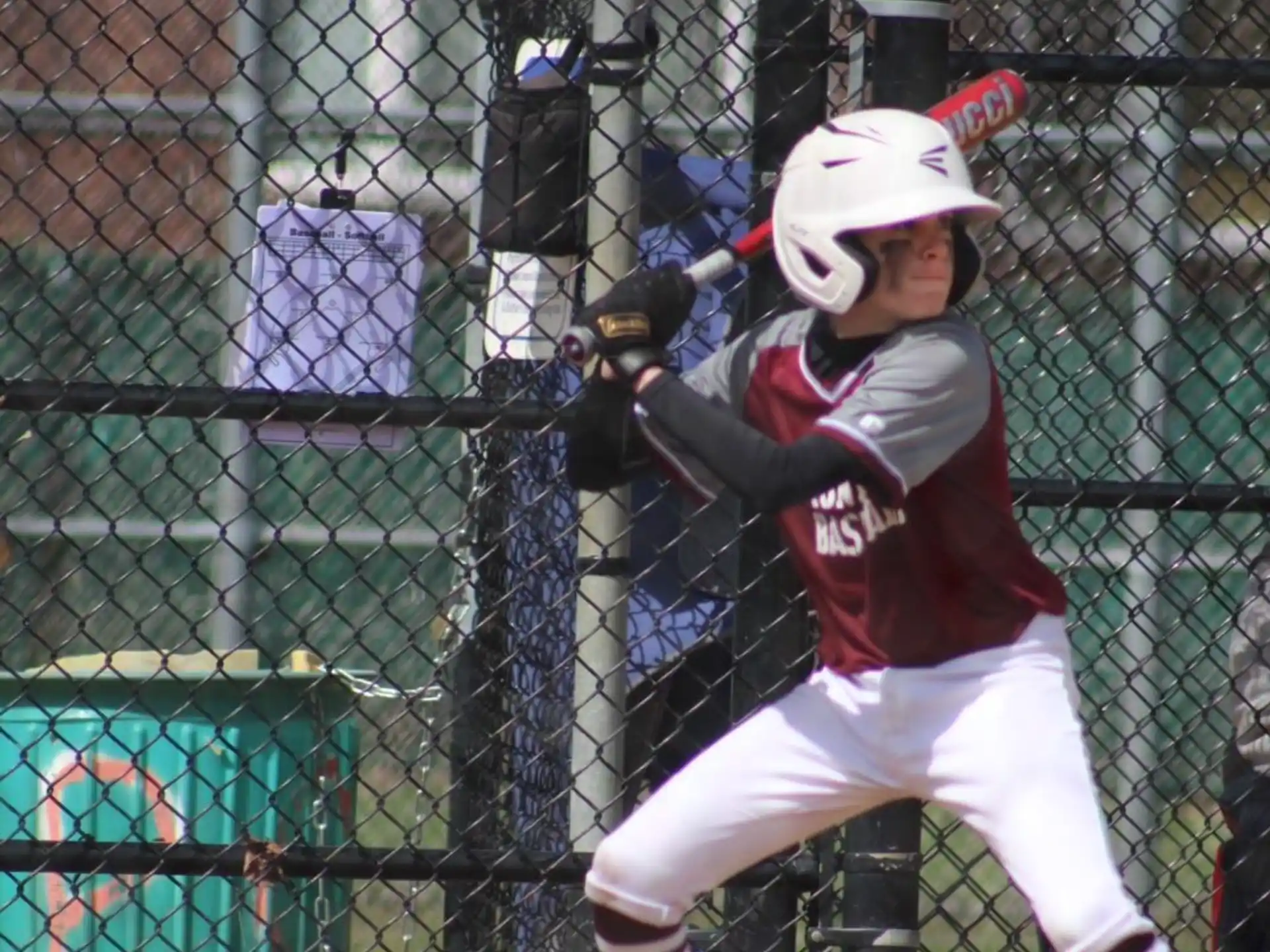 a young boy playing baseball