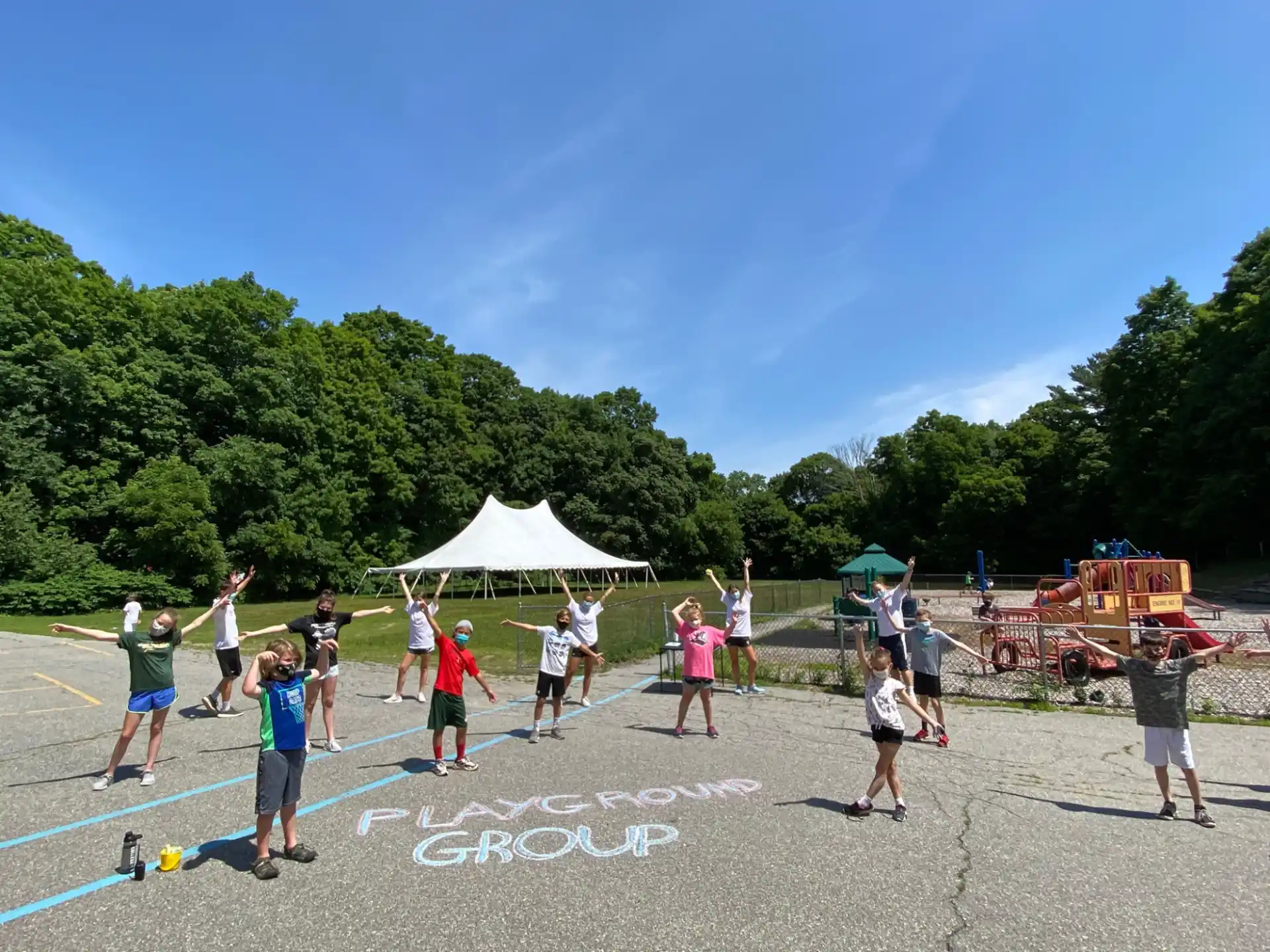 a group of people playing volleyball