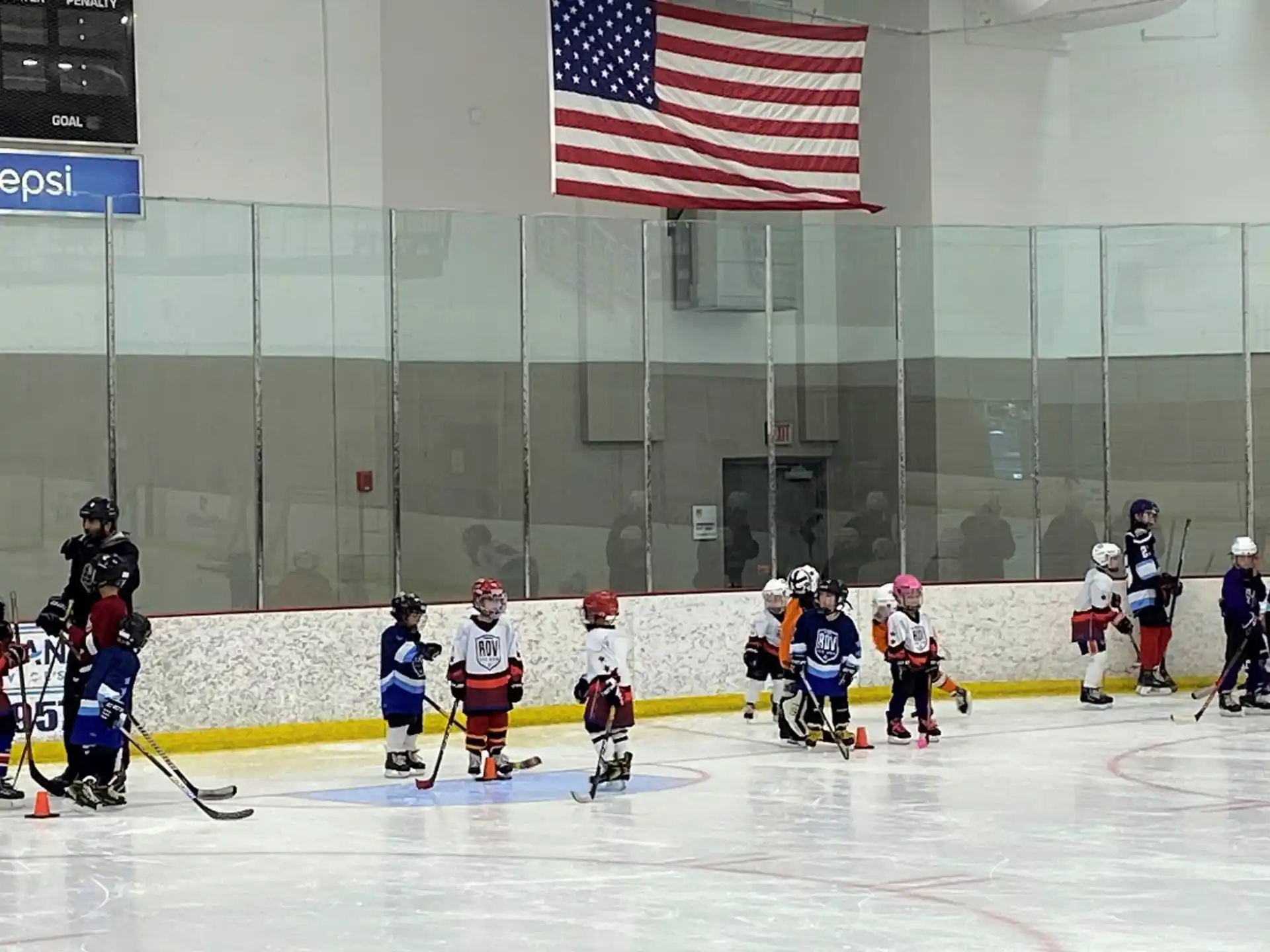 a group of people playing hockey