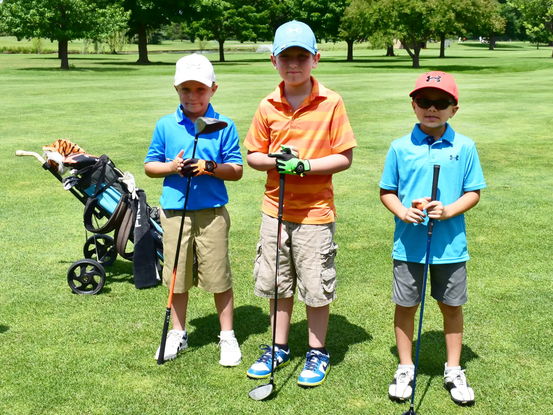 a group of people on a golf course